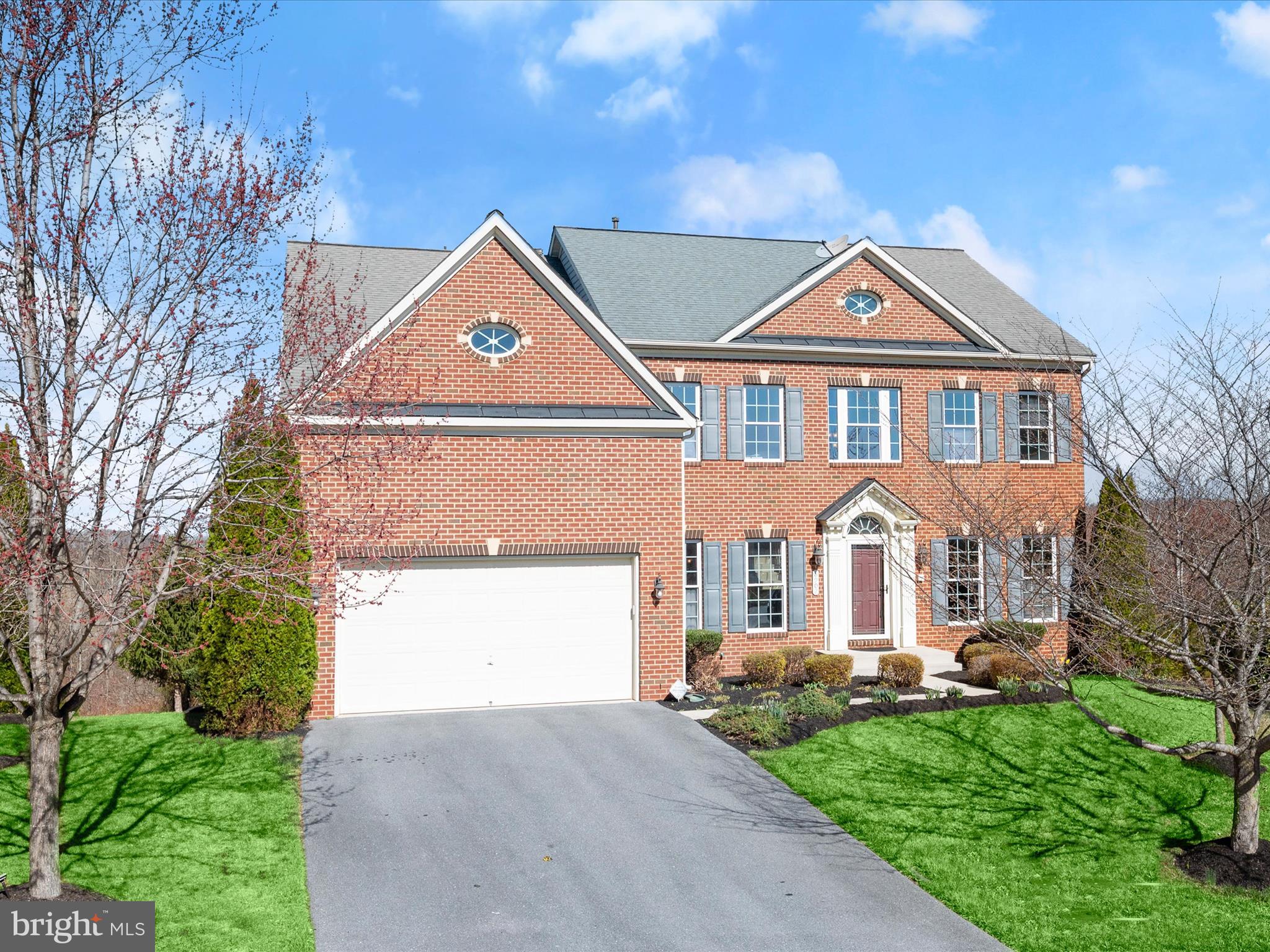 OFFER DEADLINE HAS BEEN ESTABLISHED: Monday, March 24, 2025 12:00 Noon. Introducing this exceptional home in the Villages of Urbana, featuring five bedrooms and four and a half bathrooms across three beautifully designed levels. Situated on a 0.26-acre cul-de-sac lot, this home backs to trees, offering a lovely wooded backdrop view. Step into the two-story foyer, where hardwood floors extend through most of the main and upper levels. A neutral color palette and abundant natural light enhance the spacious feel, while elegant trim, including chair railing, wainscoting, and crown molding add character throughout. Off the foyer, stately columns define the inviting front living room and the formal dining room connects to the kitchen via a butler’s pantry for seamless entertaining. At the heart of the home, the family room impresses with a soaring two-story ceiling and a cozy gas fireplace. Prepare your favorite meals in the expansive kitchen that boasts granite countertops, 42-inch cabinets, a center island, and a walk-in pantry. Stainless steel appliances include a gas cooktop with a built-in range hood and double wall ovens. The adjacent breakfast room, with its vaulted ceiling, provides a bright space for casual meals and opens to the deck for easy indoor-outdoor living. Nearby, the laundry room offers direct access to the two-car garage. A private office with French doors and a half bathroom complete the main level. Upstairs, the primary bedroom suite showcases a tray ceiling with crown molding, two large walk-in closets, and an en-suite bathroom with dual vanities, a soaking tub, and a walk-in shower. A second bedroom features a private en-suite bathroom, while the third and fourth bedrooms share a bathroom with dual sink vanity. Downstairs, the finished lower level extends the living space with a fifth bedroom that has a walk-in closet and an attached full bathroom—ideal for guests. A spacious recreation room with a wet bar provides ample room for everyone’s activities and leads outside to the backyard. Additionally, the lower level includes a utility room and two large storage areas. Enjoy outdoor living on the deck overlooking the backyard and wooded views. Located in the sought-after Villages of Urbana, this home offers incredible convenience with nearby shopping, dining, entertainment and more. Parks, trails, and a wide variety of excellent community amenities, including the Natelli Community Center and Urbana District Park, are just moments away.