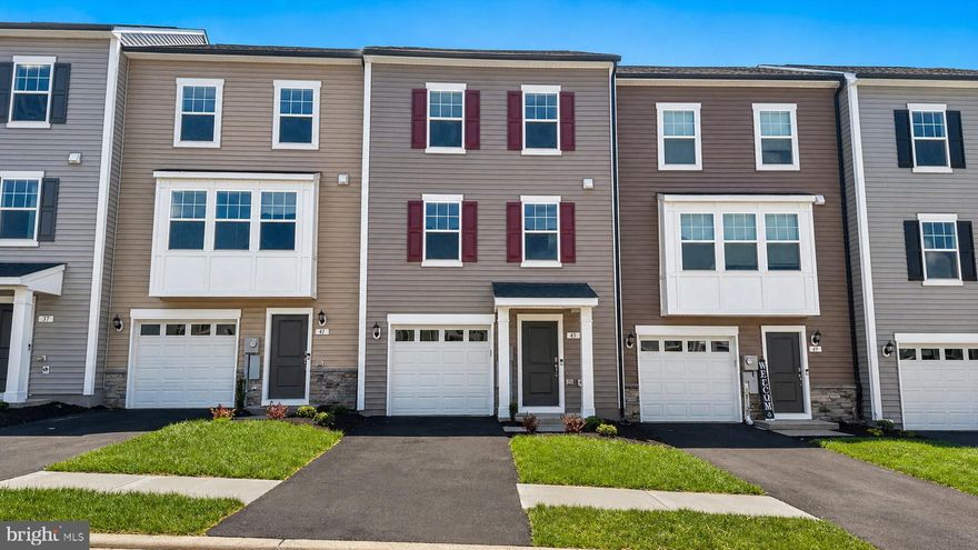IMMEDIATE MOVE-IN – LIMITED-TIME INCENTIVE!* NOW OFFERING UP TO $12,500 IN CLOSING COST ASSISTANCE FOR PRIMARY RESIDENCE WITH USE OF APPROVED LENDER AND TITLE** Experience one of the best values per square foot in Inwood, WV with this move-in ready, brand-new townhome in South Brook. This home showcases stunning mountain views paired with a bright, designer-inspired interior—featuring white cabinetry, white quartz countertops, and a crisp white backsplash for a clean, modern aesthetic buyers love. Enjoy spacious, open-concept living with the largest townhome floorplan in the community, designed for both everyday comfort and entertaining. All of this in a prime location just minutes from downtown Martinsburg, with quick access to shopping, dining, and I-81 for an easy commute. Low-maintenance living, high-end finishes, and immediate availability—this is a rare opportunity you don’t want to miss. Schedule your tour today before this April incentive is gone!