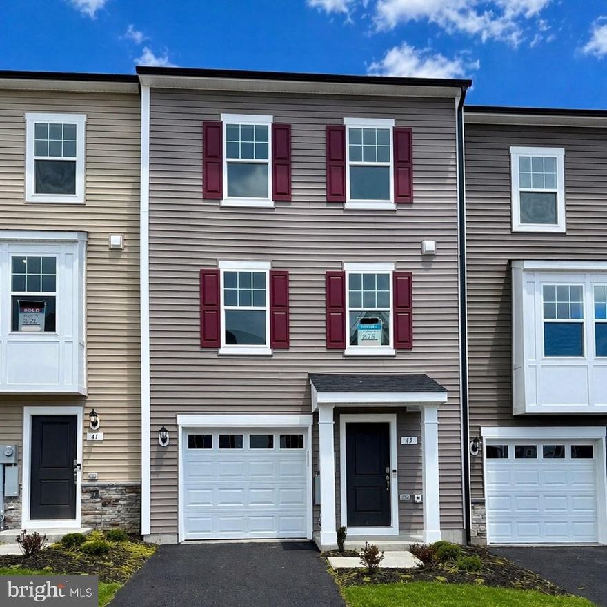 IMMEDIATE MOVE-IN – LIMITED-TIME INCENTIVE!* NOW OFFERING UP TO $12,500 IN CLOSING COST ASSISTANCE FOR PRIMARY RESIDENCE WITH USE OF APPROVED LENDER AND TITLE** Experience one of the best values per square foot in Inwood, WV with this move-in ready, brand-new townhome in South Brook. This home showcases stunning mountain views paired with a bright, designer-inspired interior—featuring white cabinetry, white quartz countertops, and a crisp white backsplash for a clean, modern aesthetic buyers love. Enjoy spacious, open-concept living with the largest townhome floorplan in the community, designed for both everyday comfort and entertaining. All of this in a prime location just minutes from downtown Martinsburg, with quick access to shopping, dining, and I-81 for an easy commute. Low-maintenance living, high-end finishes, and immediate availability—this is a rare opportunity you don’t want to miss. Schedule your tour today before this April incentive is gone!