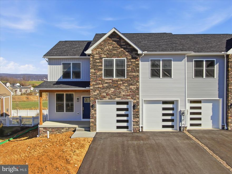 BRAND NEW  WITH FULL WALK OUT LOWER LEVEL AND DECK FEATURING GORGEOUS  MOUNTAIN VIEWS!
This home is a 1/2 Duplex  offering 4 Bedrooms and 2.5 Full Baths  You will not be disappointed in the upgrades which include a waterfall granite kitchen island, walk in closets, stainless steel appliances, Separate Laundry Room, Pantry, Large Storage Closet in Garage,2 car garage with opener, covered front porch and more. *Kitchen Cabinet Color is different per home.
Only 40 MINTUES to FREDERICK,  this home features  convenience to shopping yet rural enough to offer tranquility. *Taxes are Estimated.
It is available now and can be toured anytime. 
Call to schedule your tour and gather more details.
