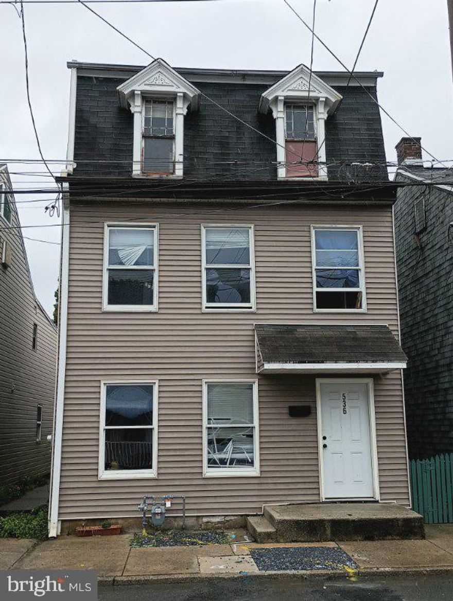 ****Offer Received! Offer Deadline set for Tuesday 10/03 @ 6 pm!****Fantastic opportunity with this investment property! Perfect for the investor looking for a rehab project for the opportunity to build sweat equity!  Currently the building is vacant and has 3 seperate units that all need work! The two-story garage in the rear of the property is alley accessible! Bring your imagination and make your ideas happen! Check it out today while there is yet time! Property is classified as a 2-family residential property on the tax records but the city is is saying it is a single family residence! There is currently 3 units in the property and the buyer would need a special exemption from the city to keep it a 3 unit!