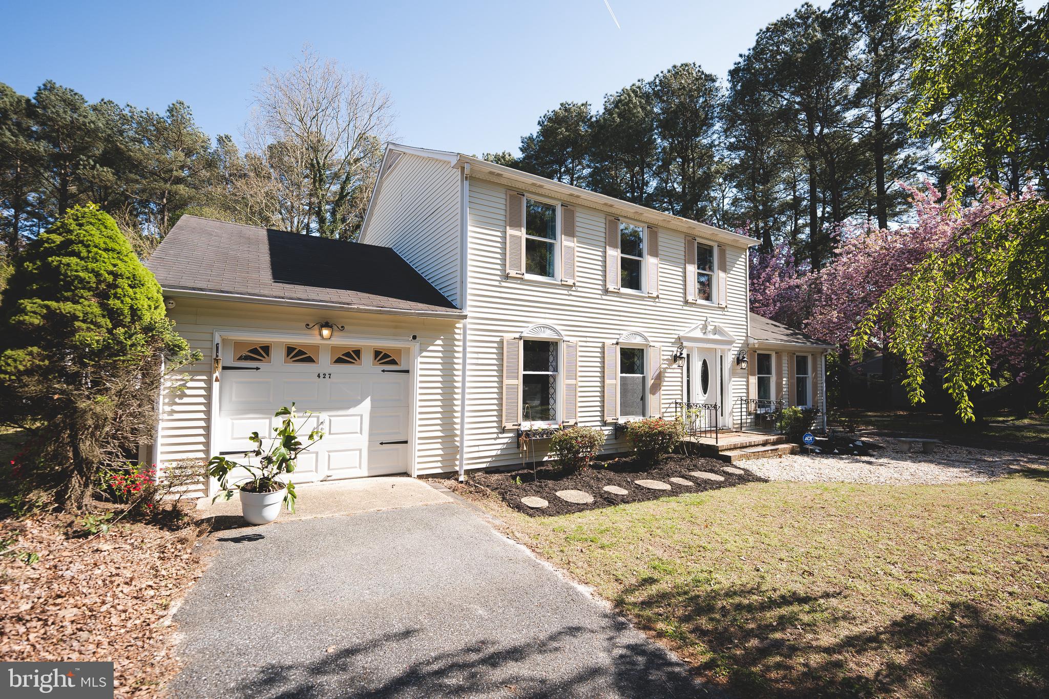 This warm and inviting 3BR/3BA home is close to everything but on a private lot. Perfect for entertaining with two driveways, a spacious kitchen with island, screened porch, covered outdoor space for cooking or eating in the fenced rear yard, both a living & family room, and a separate dining room! Three spacious bedrooms and three full bathrooms complete this home. Pets accepted with owner approval. Tenant responsible for providing trash service.