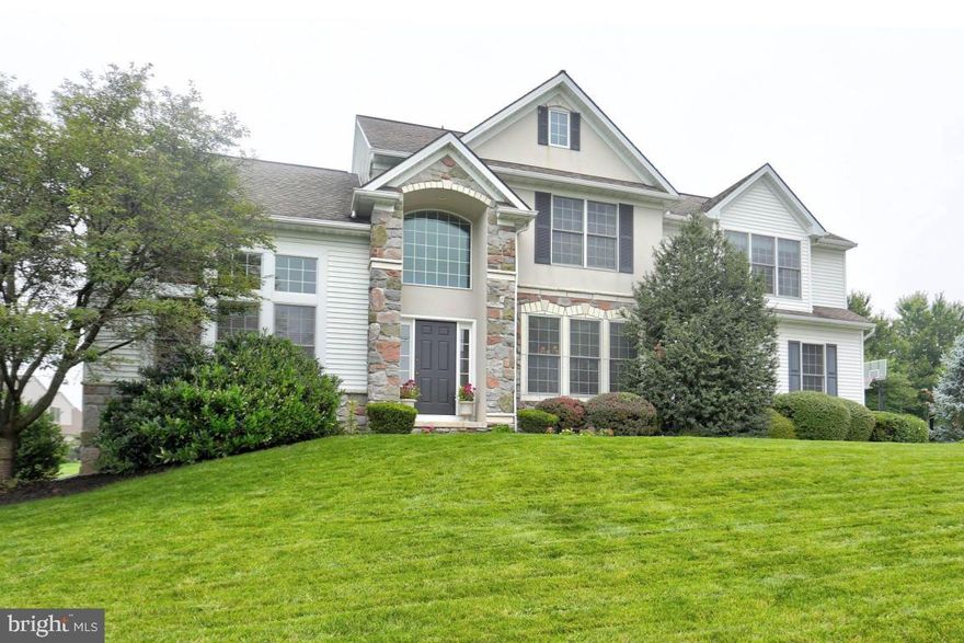 Beautiful & Stunning well cared for home in Lampeter Strasburg School District.  "San Marino" Floor Plan featuring High Ceilings in Living Rm, Family Rm, & Foyer.  Very Open & Spacious Home.  You will be welcomed by a grand 2 story foyer w/new engineered wood floors.  Large Family Rm is highlighted w/beautiful natural daylight from lots of windows & features high ceilings, gas fireplace & recessed lights.  Spacious eat-in kitchen w/island, tall wall cabinets, double electric wall oven, pantry closet, recessed lights, and plentiful cabinet storage & counter space.  Dining Rm is accented with columns & crown molding.  Living Rm has high ceilings, arches, crown molding, recessed lights.  Hall with archway and double doors lead into Master suite w/walk in closet and master bath with