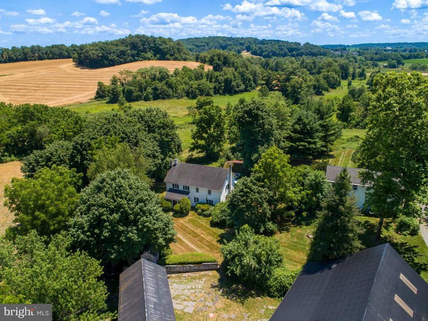 Situated in the rolling hills of Elverson sits 50 acres of Blue Rock Farm, established in 1790, which boasts a 5 bedroom/2 bath home, barn, dairy barn and a terrific 2 unit tenant house- outstanding multi-use compound. The 3072 sqft. home includes original hardwood floors throughout with a large wood burning fireplace and beautiful great room containing high ceilings, large windows and exposed stone from the original house. The detached 2 story, 2 unit apartment building is approximately 2,700 sqft . Each contains a kitchen, living room, 3 bedrooms, and a full bathroom.  The farm has 50 acres of rolling and flat farmland, wooded acres and is completely unrestricted. Roughly 22 of the 50 acres are zoned commercially and 26 residential. (Please see zoning map-East Nantmeal Twp). You are sure to be amazed at this first-time offering in the last 60 years, there are many possibilities for the future of this property. Come and see this rare opportunity in Elverson for yourself today!