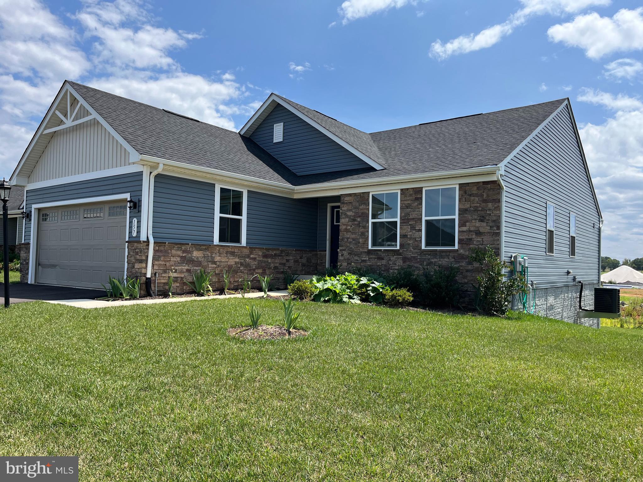 New Rancher located in Cardinal Pointe. Features spacious open floor plan. All stainless appliances, granite countertops. Master suite with walk-in closet and bath. full unfinshed basement with outside entrance to back yard. 2-car garage. Convenient to stores, schools, and interstate travel North and south. Move-in Ready!