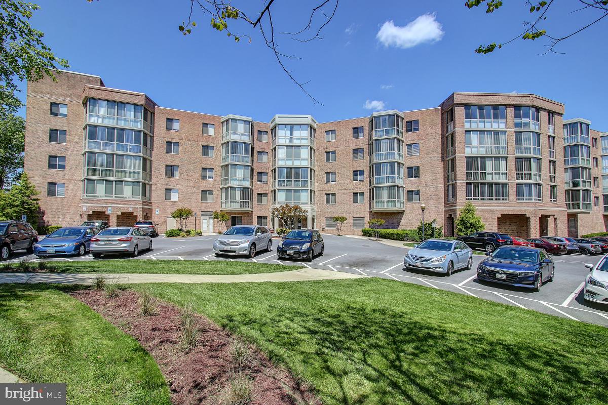 Welcome to Turnberry Courts at Leisure World! This top floor"R" model two bedroom + two bath features a table space kitchen with lots of storage plus counter space, a spacious formal dining room with gleaming wood floors and a custom built-in wall unit, and a sunroom with a golf course/treed view. The second bedroom can double as an office with a built-in desk and book shelves as well as its own access to the sunroom. Mirrored closet doors, laundry area with additional shelving, near to the elevator. New bathroom floors and all updated appliances. Entire condo is freshly painted. and all wallpaper removed. Enjoy the community amenities including shuttle service, security, classes, pools (indoor and out), tennis, fitness center, medical center, 18 hole golf course ,pickelball , restaurants , clubs to join ... the list goes on. Come Live the Leisure World Lifestyle at Turnberry Courts. Reduced and priced to sell quickly!!