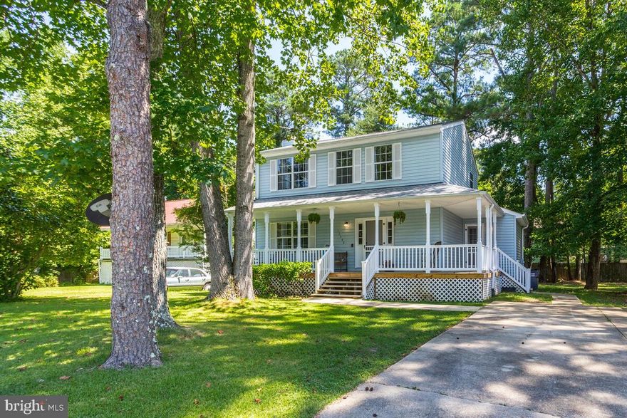 This Charming Farm House Will Make You SMILE! Welcome to 11542 Tomahawk Trail West in Lusby! This 3 Bed, 2.5 Bath Home has Been Working Through a Transformation, Inside and Out!  In Just 3 Years, She's Gotten a New Roof ('19), New HVAC (Inside and Outside)('21), a Renovated and Upgraded Kitchen('22), New LVP Flooring Throughout('22), a New Water Heater(21), even New French Drains('20)!  With Loads of Flat, Usable Land, and By Clearing a Few Trees, the Next Project Was Adding 'The Dream Garage', a 40x24 Double Garage onto this Corner Lot, But They Ran Out of Time!  Ask About It!  There is a Totally Affordable Option to have One Here!  For Now, the Work Shed outback includes some nice creature comforts like Cable, Electric, Work Benches and Loft, All INSIDE the Shed! The  Roomy Screened Porch has be Re Roofed and the Gutters Moved to Keep Out Water (though old stains are still slightly visible) and is Great Space for Entertaining! This One Just Feels Like Make Your Appointment Today!