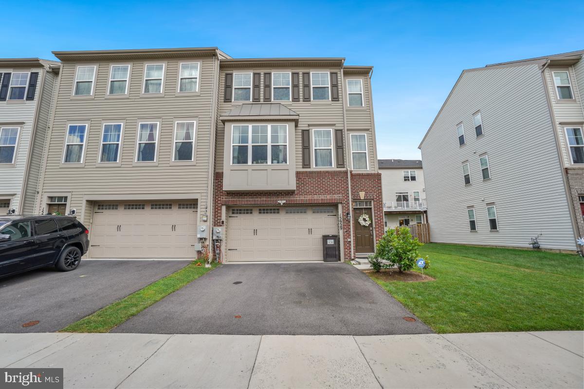 Welcome to this stunning 5-year-young end-unit townhouse in the highly sought-after Bradford’s Landing community! Thoughtfully designed and filled with upgrades, this spacious three-level home offers the perfect balance of modern elegance, comfort, and functionality.
The main level showcases a modern kitchen featuring a sleek peninsula with seating for four, 42" cabinetry, gleaming countertops, stainless steel appliances, and generous storage. The adjoining dining area flows seamlessly into the expansive living room, creating an ideal setting for both entertaining and everyday living. Step outside to the private deck—perfect for morning coffee or relaxing evenings. A versatile den/office and a stylish powder room complete this level.
Upstairs, the luxurious primary suite is a true retreat, highlighted by a custom walk-in closet and a spa-inspired ensuite with a walk-in shower, and dual vanities. Two additional bedrooms, a beautifully appointed hall bath, a convenient laundry area, and a spacious landing provide comfort and ease for the entire household.
The finished lower level offers exceptional versatility with a welcoming entry from the garage, a fourth bedroom, and a third full bath—ideal for guests, a home office, or a recreation space.
Outside, enjoy low-maintenance living with a fenced backyard that has been thoughtfully upgraded with pavers, creating the perfect spot for outdoor gatherings or quiet relaxation. A new HVAC system is a plus!
Combining style, comfort, and convenience in a prime location, this exceptional home is ready to welcome its next owner—don’t miss your opportunity to make it yours!