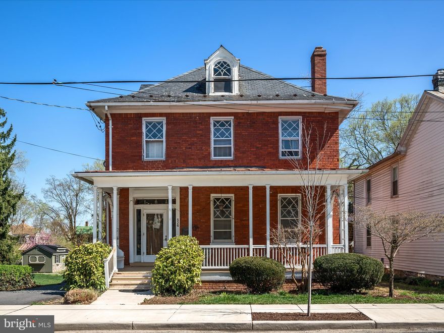 Stately all-brick colonial home in the heart of Winchester, offering 4 bedrooms and 2.5 baths, ready for your personal updates and finishing touches. This charming residence features a grand foyer, front and back staircases, spacious rooms, hardwood floors, high ceilings, and even an elevator.

The kitchen includes a built-in hutch, while the formal dining and living rooms—complete with a cozy fireplace—provide the perfect setting for entertaining. Step outside to enjoy the expansive front porch or the double screened-in porch overlooking a tranquil koi pond and bamboo.

The generous backyard offers off-street parking, and the detached garage with electricity is ideal for storage or a workshop. Updates include electrical work (circa 2004), a furnace (approximately 10 years old), and a water heater (about 5 years old).

A fantastic opportunity in a prime downtown location!