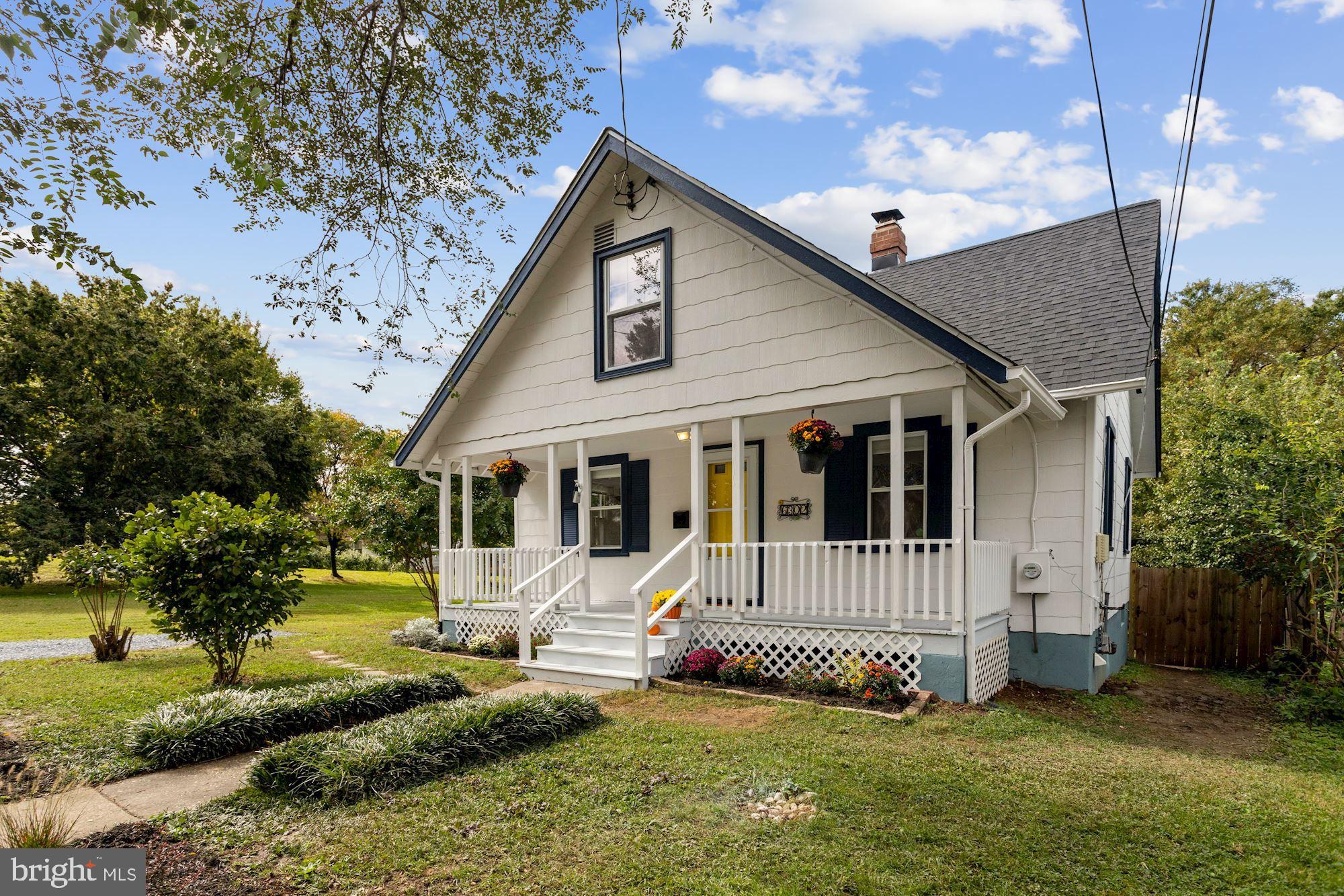 Lovingly renovated 3 bed, 2 full bath bungalow located on a cul-de-sac in the heart of idyllic Riverdale Park. The main level boasts an open concept that provides beautiful flow throughout the home, with a fully renovated kitchen and bathroom as well as beautifully refinished wood floors in the living room, dining room, and two 1st floor bedrooms. Kitchen features granite countertops and stainless steel appliances. Enjoy hosting company in your sun-filled living and dining rooms while preparing hors d'Oeuvres and cocktails in the nearby kitchen. The upstairs owners' suite is complete with skylight and set apart office/den space, perfect for those looking to WFH. Not to mention it has a renovated en-suite bathroom and new carpet throughout. If outdoor space is what you need, enjoy your large, crape myrtle-filled backyard with a spacious rear deck and ample greenery that makes for great relaxation. And let's not forget the front porch, which is perfect for morning coffee/tea or relaxing after a long day of work. The entire house is also newly painted inside and out with a brand new roof with 5-year warranty! The unfinished basement provides ample space for storage with washer/dryer access, just serviced and tuned up oil furnace, and newly installed sump pump. The driveway includes 1 graveled, off-street parking space. Oh, and did I mention the location? Perfectly situated between Riverdale Park's Town Center and Riverdale Park Station, with direct access to the 3.8 mile Trolley Trail steps from your front door and only 1/2 a block to the Riverdale MARC Station, this is urban-suburban living at its finest! Taking the sidewalk to the trail, you are a mere two-minute walk to Town Center Market for drinks, Tapas, Pho, BBQ, and Vegan for food, and Bikram Yoga, when you're ready to exercise. Or maybe tonight you want to take the 10-minute stroll on the Trolley Trail and grab a beer at Denizens before having a delicious dinner at Burton's Grill. You can always cook at home too, with Whole Foods just half a mile away and the weekly farmer's market steps away. The neighborhood park with playground is nearby, too. And the house is only 1 mile to the University of Maryland, the Prince George's Plaza Metro, and future Purple Line, while being a stone's throw to Washington D.C. and one MARC stop from Union Station. I can't say enough about this one, come get it before it's gone! Note: Adjacent lot owned and maintained by the town of Riverdale Park.