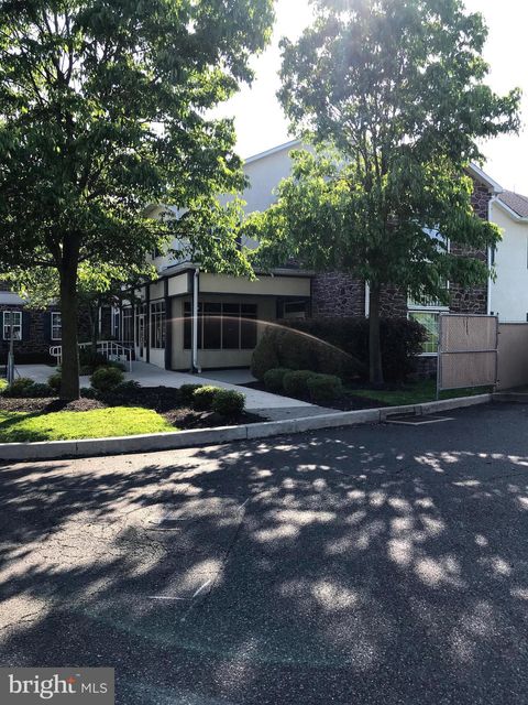 Photo of 296 W Ridge Pike #LL101, ROYERSFORD, PA 19468 (MLS # PAMC2170718)