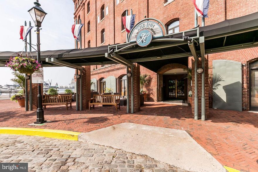NEW PRICE! Located in Henderson's Wharf in Historic Fells Point, a waterfront renovated tobacco warehouse, this freshly updated large one bedroom, one bath loft condominium is in a secure building in one of the best locations on a quiet peninsula in Fells Point. Its two multilevel exposed brick walls add additional charm. The newly renovated master bath includes a large vanity with lots of extra storage. New hardwood like flooring in the main level and new carpet throughout in the freshly painted home enhance this move-in ready condominium. Enter the attached garage where your parking space is located directly from the building. The main lobby of the building was recently renovated. Common outdoor spaces include an updated courtyard garden with outdoor seating and firepit as well as waterfront seating. The residence is located on a quaint cobblestone street in historic Fells Point close to restaurants with outdoor dining, shopping, nightlife, hospitals, & major commuting routes. Step out the building's front door and enjoy a short walk along the waterfront to great restaurants, shopping, and all the wonderful amenities Fells Point has to offer. Available Immediately  Pets case by case