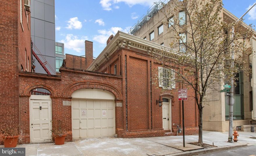 Unique, all brick, Carriage House with appointments designed by renowned David Weisand. Located in the heart and soul of Mount Vernon, this is a must see!! Open floor plan with exposed beams.  Large first level   with powder room unlike any other.... and distinctive kitchen! Huge bedroom on entire second level with designer full bath.  Large, one car, attached garage with ample room for storage.  Easy access to Penn Station, the Walters Art Gallery, the Peabody, MICA, Baltimore School for the Arts, Baltimore Symphony Orchestra, 
Historical Society, and the original monument to George Washington!!