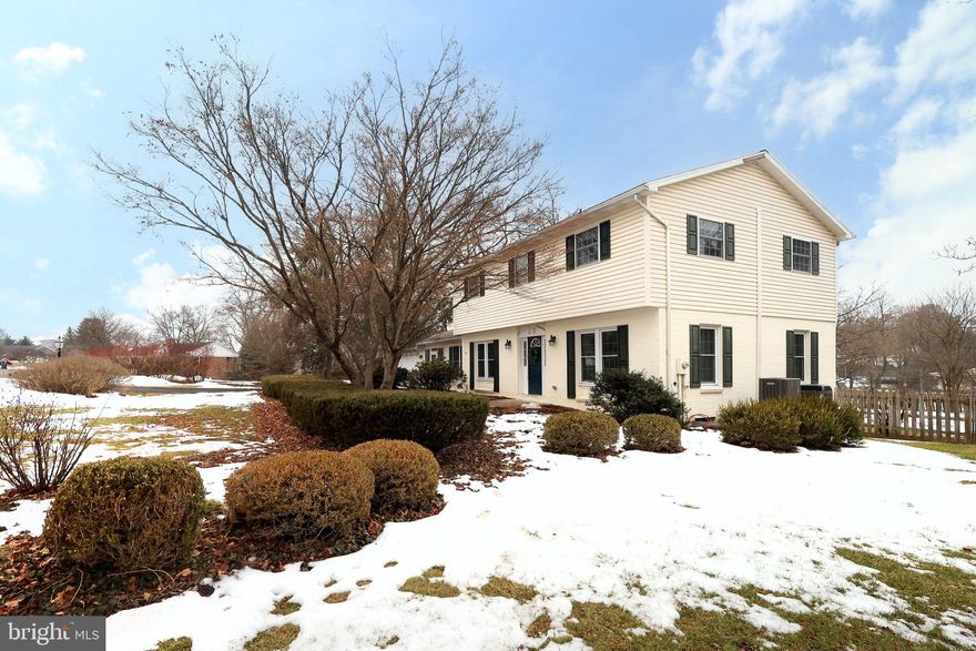 OPEN HOUSE - Sunday, February 22nd, 12:00 - 1:30 PM.  Stately two-story home with great curb appeal on a gorgeous lot! This well-cared for State College home is set on a spacious 0.4 acre lot and has ample space in both the front and back yards. You will dream of warm spring and summer nights on the large deck!  Inside the home you will find multiple large living spaces for the family to enjoy, where everyone can gather comfortably or where everyone can find their own space. The main level also features an eat-in kitchen with lovely views into the back yard, a half bathroom, and access to a roomy sunporch.  
Upstairs, you’ll find four well-sized bedrooms, including a private primary suite, and a full bathroom designed for convenience. The lower level features plenty of storage and workshop spaces. There is direct access to the backyard from the lower level and surprising amounts of light! 

This lovely home is truly a gem, combining classic charm, generous space, and a desirable location close to shopping, dining, recreation, and local amenities. It is a home with comfort, flexibility, and a wonderful place to settle in. Schedule your private tour today!