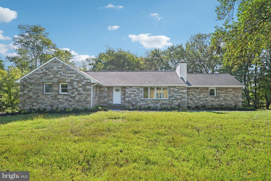 Don't miss this beautiful move-in ready 3-bedroom home in the highly desirable Maple Glen neighborhood, set on 2.2 acres of land! The main level features a spacious living room with a wood-burning fireplace, a formal dining room, and a huge kitchen with brand new appliances.  Also conveniently located on the main level, you’ll find three generously-sized bedrooms, including the spacious Primary Bedroom with a walk-in closet and beautiful ensuite bath with new tile. The two secondary bedrooms are served by another full bath with new tile in the hall. The large walk-out basement is ideal for multi-generational living, offering a living room area with a wood-burning fireplace, a kitchenette, a third full bathroom, and a bonus room. Outdoor living is just as impressive with a beautiful Trex deck overlooking the expansive property. Additional upgrades include brand new luxury vinyl plank flooring throughout, a new roof, new driveway, new HVAC and water heater. Located within the highly sought after Hatboro-Horsham school district with easy access to the highway and commuter routes. *Mortgage savings may be available for buyers of this listing.*