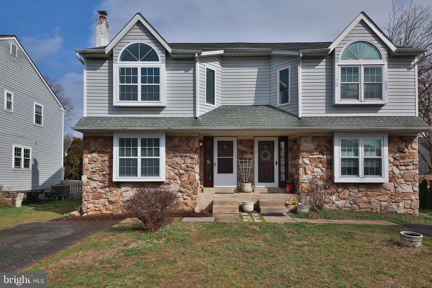 This fully renovated twin home in Doylestown Boro is ready for immediate occupancy and features brand new windows, flooring and is freshly painted.  The first floor has durable laminate flooring throughout, which includes a living room, formal dining room, eat-in kitchen featuring granite countertops, and a powder room. Upstairs the primary bedroom has brand new neutral carpet, a vaulted ceiling, and a completely updated en-suite bathroom with oversized stall shower. Two more bedrooms, both with ceiling fans and brand new neutral carpet share the updated hall bath which has a tub/shower combo. The finished basement has neutral carpet and ample storage room. The rear deck is accessible via a new sliding door from the kitchen, and leads to the private back yard. This home has off-street, driveway parking, is conveniently located for entertainment, shopping, and dining in Doylestown Boro.