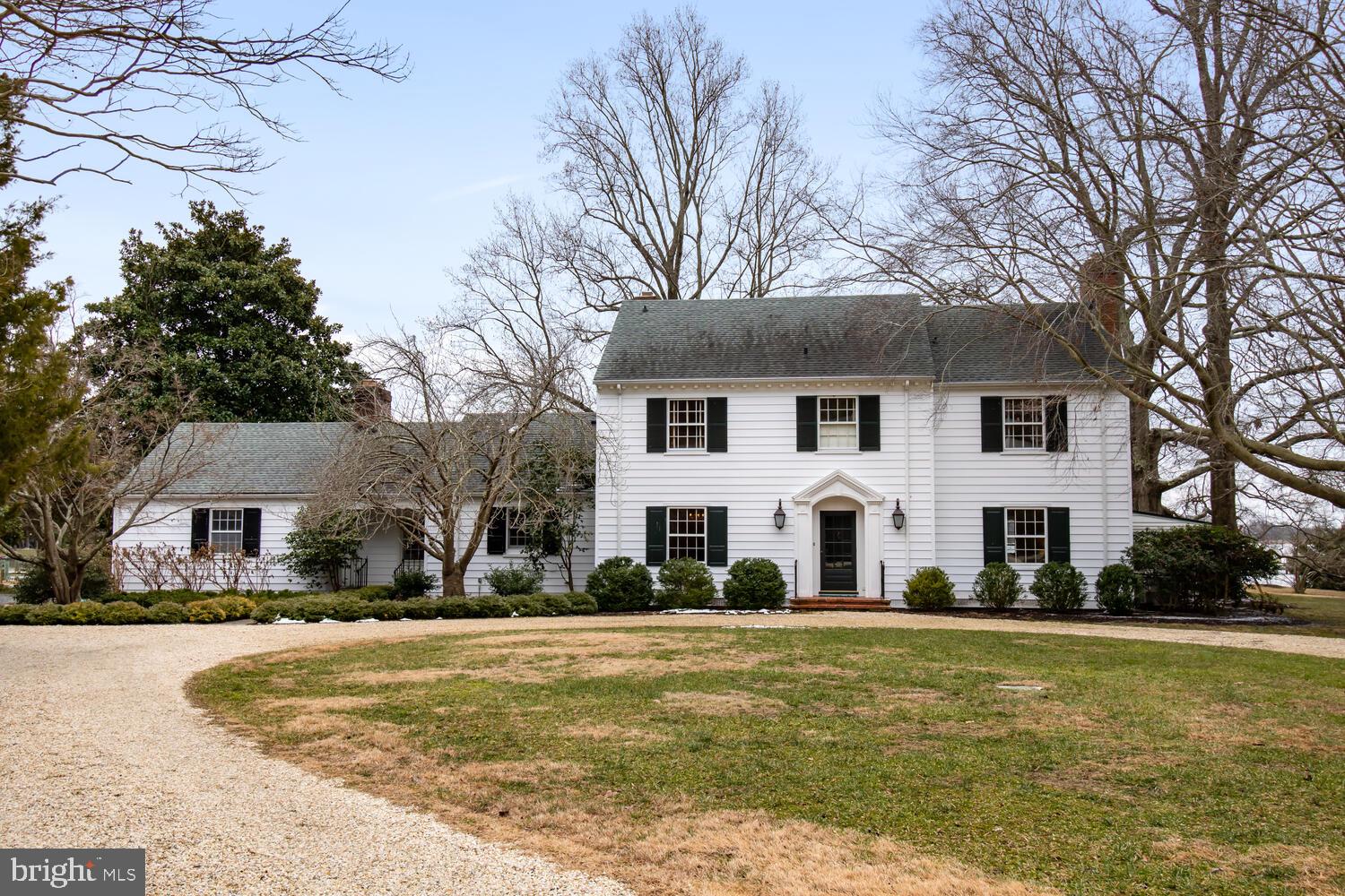 Located in the Easton/Oxford Corridor on Bailey's Neck, this classic Eastern Shore Colonial home enjoys commanding views of Trippe Creek from Snug Harbor. The house was built in 1953 and has benefitted from continual maintenance and thoughtful upgrades. Since 2014, the kitchen and bathrooms have been completely renovated, the waterside doors and windows replaced, a screen porch installed, and the roof replaced. A new vapor barrier and dehumidifier were added to the crawl space and the thermal barrier was moved to the foundation wall, along with new attic insulation. The shoreline has RipRap and Bailey Marine replaced the dock which boasts four slips, electric hoist and 7'+ MLW in one of Talbot Counties most protected anchorages. The property contains exactly six acres of land with mature trees and there are three accessory structures, a detached two car garage, waterside boat equipment shed, and garden shed.