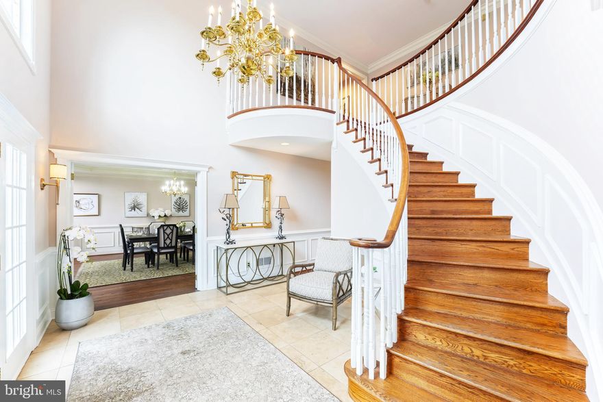 Exquisite executive property with a very convenient location, 15 minute commute to downtown Wilmington, DE including the newly renovated Amtrak NE Corridor train station and within 45 minutes of Philadelphia and 10 minutes to the award winning town of Kennett Square, PA.  This beautiful home is situated on a cul-de-sac of 20 comparable homes on a quiet street lined with mature trees and landscaping.  The house has a circular driveway, 3 car garage, and 4 bedrooms (with a possible 5th on the first floor), 5 baths (3 full and 2 half) for a total of approximately 6,000 square feet of above grade living space. From the moment you enter the home, you will see the attention to details and custom finishes throughout, starting with the grand foyer entrance with curved staircase worthy of a Gone With The Wind moment. The property abounds with upgrades including kitchen upgrades, custom moldings, beautiful elevated screened-in porch, heated garage among many others.  The first floor has multiple living spaces; off the kitchen and breakfast room is a 3 season room with a gas stove and lovely light filled windows.  Just off the expansive family room is a wet bar area and a huge enclosed sun porch, perfect for enjoying views of the private wooded backyard.  Adjacent to the sunporch and conveniently located near the mudroom, is an office. The main staircase leads to a spectacular master bedroom suite at one end, complete with work out or yoga room and an expansive master bathroom with vaulted ceilings.  The other two bedrooms and hall bathroom are located at the other end of the home.   The second master bedroom suite is located over the garage and accessed via a separate staircase; perfect for a nanny or au pair or for those out of town guests.  There is a huge unfinished walk out basement that provides more than ample storage. The interior is well maintained and the property has a newer roof, however, pricing reflects that windows are original and in need of replacement and decks and outdoor structures are also in original condition.  The living space and flow in this home exudes gracious elegance and ample space for living and entertaining.  Come see this beautiful property and you will surely want to call it home.