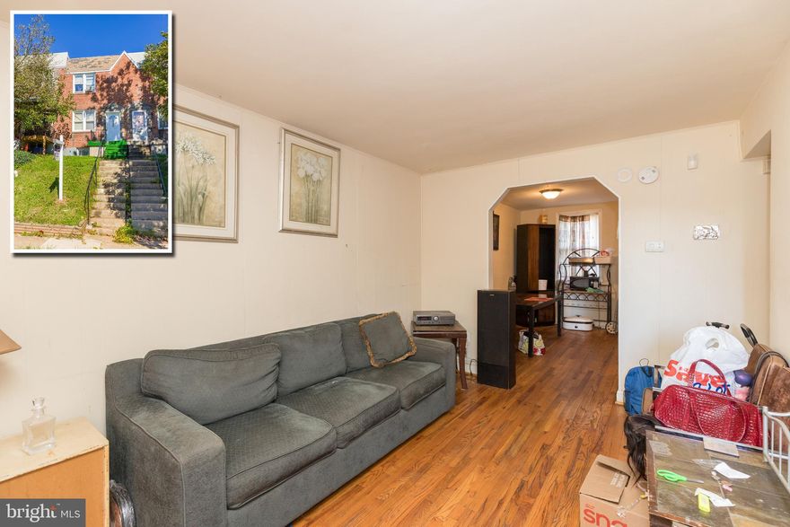 TURN KEY INCOME PRODUCING ROWHOME WITH LONG TERM TENANT IN PLACE!  Current MBQ tenant in place who's monthly rent is $1,019/mo.  Main level with a spacious living room and separate dining room w/ hardwood floors and a galley kitchen.  Upper level with 2 bedrooms and 1 full bath.  Partially finished basement w/ laundry/storage area, and a rear fenced yard.  Perfect opportunity to add to your rental portfolio.  Sold As-Is!