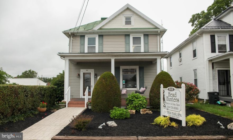 Prime opportunity to own a fully operational salon space in the heart of Ranson! Welcome to 212 W 3rd St — a versatile commercial property ideally set up for beauty professionals, wellness services, or boutique retail. This well-maintained building offers high visibility, easy access from WV‑9 and WV‑115, and is surrounded by growing residential and commercial development.

The interior features a welcoming reception area, multiple salon stations, private treatment rooms, a shampoo area with plumbing in place, laundry hookups, and ample storage. Stylish flooring, updated lighting, and a clean, professional atmosphere make this a turnkey opportunity for an established business or a new venture. Plenty of natural light enhances the space, creating a bright and inviting experience for clients.

Outside, enjoy a charming front entrance, off-street parking, and additional street parking for customers. The building is zoned for commercial use and is move-in ready.

Whether you're expanding or launching your beauty business, 212 W 3rd St delivers a strategic location, functional layout, and salon-specific features that are hard to find. Schedule a showing today! 

More Photos to come!