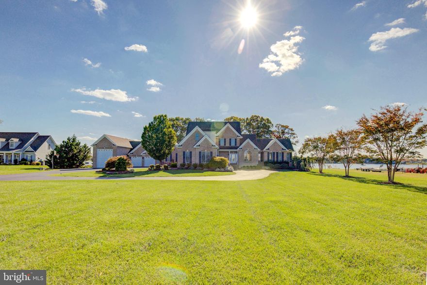 Welcome to your river retreat!  This gorgeous, custom built, waterfront  home sits on 2 + acres, overlooking Mattox Creek off of the Potomac River.  This property is filled with plenty of outdoor living and recreational space.  You'll enjoy beautiful views of the water from the deck or pier.  The pier has two boat lifts and two jet ski lifts, and when you're done playing in the river, you can relax in the heated, saltwater pool or hot tub.  This property is set up for entertaining:  a gourmet kitchen with Omega cabinets and top of the line appliances, an enclosed outdoor kitchen and bar, a sound system throughout the home and a fully finished basement (also with a bar) that walks out to the pool deck.  You'll have plenty of space to store your toys, because there are 5 garage spaces, and one of them is oversized to fit an RV or boat.  Then at the end of the day, you can cozy up next to one of the three fireplaces with a book from your built-in bookshelves.  This property is stunning and has too many upgrades to list here!  Schedule your private tour today to appreciate this home in person. Check out the virtual tour and showing tour video, as well!