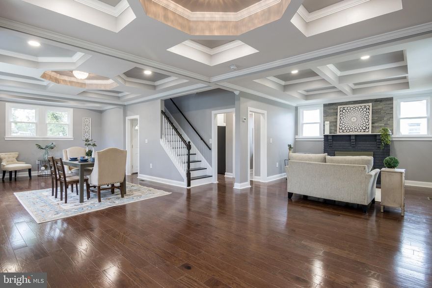 Welcome Home!  Completely Renovated, The entrance opens up into the formal dining room as the heart of the home with coffered ceilings. This Gem boost 5 bedrooms 3 baths hardwood floors throughout, central air, fireplace, huge backyard for large gatherings and so much more!  A MUST SEE!