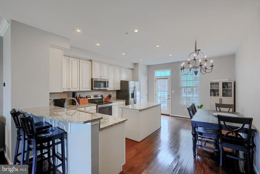 Just reduced 20K- 07/17 -UPCOMING OPEN HOUSE_ on JULY 19- 11-1pm-21224 -GARAGE TOWNHOME_ O'Donnell Square-Under the glow of Natty Boh-Beautifully maintained townhome- The best of living in the city with convenience and greenspace-3 bedroom- 3.5 bath- Ultra quiet smart garage door opener- new shelving added-Additional legit longer driveway for an extra car to park.  Also positioned on Macon with ample extra parking at the central greenspace-Architectural style roof- New glass shower insert- Master bath-  Wood floors on 2nd and 3rd floors- new wood on 3rd-LVP @ entry- Full sized washer/dryer- stainless appliances- Large kitchen with island and additional space for a large table- If you like to cook- there is a vent to the exterior- Deck off kitchen- Walk to Starbucks- Sprouts- Volo -water, Canton, Brewer's Hill and tons of other hotspots-Easy access to 95-Show and sell today!! Pet friendly neighborhood with dog stations.