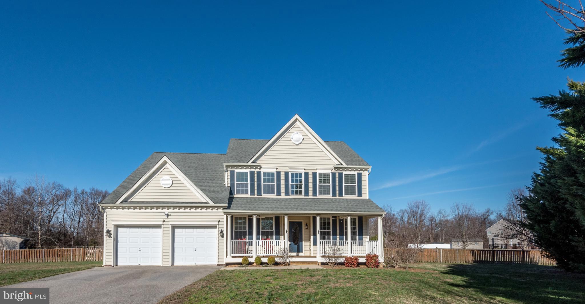You're going to fall in love in February! Tucked back in a culdesac on a level, almost 2-acre lot with fenced yard in a Leonardtown water-privileged community. Spend your winter evenings curled up by the fireplace in the family room with new carpet (hardwood beneath) or by the fire in the owner's suite on cold nights. Afternoons at your new home will be most enjoyable on the back deck watching wildlife or on the front porch relaxing under the new outdoor ceiling fans in the other three seasons...if you aren't enjoying fishing, boating, or other water-related activities at the community beach and pier. Freshened for February's new owners, the interior has been freshly painted on the main level, with large open space between the formal dining room, family room and kitchen made for gatherings. The kitchen features a sunny double window over the kitchen sink, two islands, stainless appliances with new built-in microwave oven and stove, and french doors leading to the large deck. Bedroom one of five is located on the main level and may also be used as a study. Upstairs, the bedrooms are roomy, with the owner's suite being light and spacious with a large walk-in closet and sunny windowed soaking tub in the bathroom. The two-car garage has extra space for storage/work bench. The exterior lighting has been updated, as well as the front door and shutters freshened. Whether you end your day inside or outside, make sure you don't miss the sunsets that will ensure you fall in love every day and not just in February!