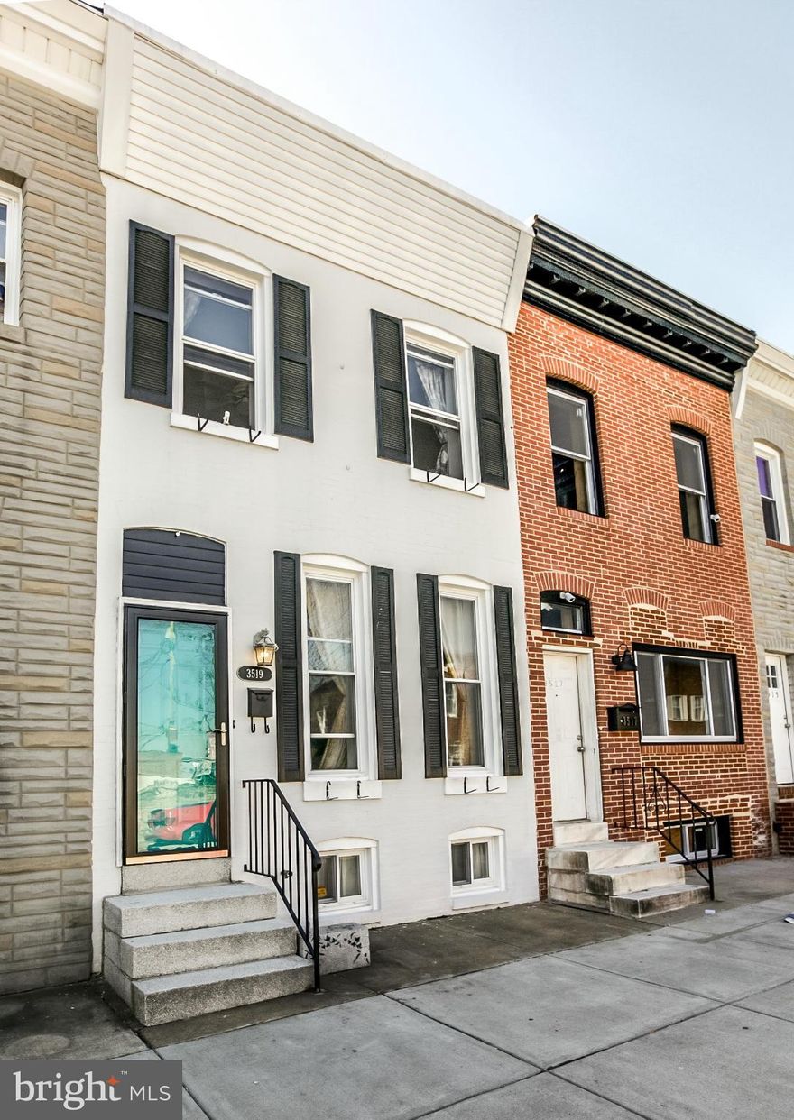 MORE THAN MEETS THE EYE! Charming rowhome with lots of original character and plenty of elbow room, plus important updates within the last several years (roof, skylights, central A/C). Updated kitchen with butcher block counters and subway tile. Wood floors on open concept main level. Newly renovated full bath.  Fresh paint and new carpet just installed. Large, fenced back yard PLUS parking pad!