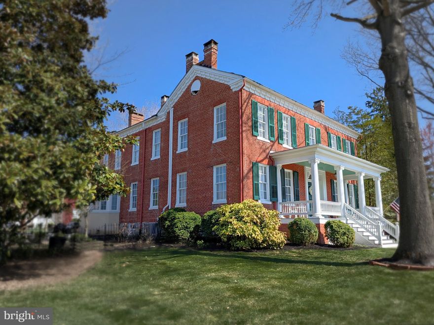 Discover a rare gem in the heart of historic New Windsor! 312 High Street presents an exceptional opportunity to own a meticulously preserved classic residence, where timeless elegance meets modern comfort. This captivating home, rich in history and brimming with original details, invites you to experience a bygone era while enjoying the conveniences of today.  
   
Character Abounds: From intricate moldings and original wood floors to beautiful fireplaces and period-appropriate hardware, every corner tells a story. Multi-level sitting porches on both above-grade levels give intimate spaces to enjoy the quiet aesthetic of times past. 
   
Grand Proportions: Experience the luxury of spacious living with generously-sized rooms, and soaring ceiling heights throughout. With the flexibility of both a large parlor and a more cozy den area, plus a formal dining room, there are multiple opportunities for both casual and more formal entertaining. An open split staircase in the foyer adds to the grandeur of the entrance, and a traditional rear staircase off of the kitchen area provides easy access to the primary bedroom. 
   
Mature Landscaping: Step outside into a tranquil oasis, where mature trees and character plantings create a beautiful and serene at-home setting. You'll be sure to enjoy morning coffee (or garden-style happy hours with neighbors!) on the naturally scaped patio--a key part of the level fenced yard space. 
Historic New Windsor Charm: Nestled in the small, picturesque Historic town of New Windsor, you'll enjoy several "mom and pop" style establishments nearby for a quick bite. Scenic country roads also lead you to nearby Westminster for easy access to even more shopping and restaurants.
   
Ready for You To Enjoy: This home has been both loved and very well cared for. Systems have been maintained, and the property shines both inside and out. Even the cellar of this special residence is extremely clean and refined, giving extra space for storage, hobbies, and more. This traditional full-brick home also delivers the practicality of both a detached carriage house (with parking for one car plus steps to ample storage space on the second level) and several dedicated parking spaces off of the alleyway. 
   
312 High Street is more than just a home; it's a piece of history. Don't miss this exciting opportunity to own a truly exceptional property. Be ready to schedule a private showing soon, and step into a world of timeless elegance.