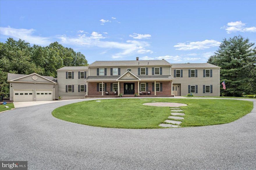 Nestled within the enchanting community of Merrywood Manor this stately Davidsonville gem exudes timeless elegance &offers a unique blend of comfort and functionality. An expansive design & thoughtfully curated features, this home invites you into a realm of comfort & leisure that feels like a permanent vacation!You will be captivated by lush landscaped grounds, gently rolling hills and magnificent, entertaining areas. Stepping inside, you'll immediately notice the seamless flow of the layout-allowing you to effortlessly roam from one living space to another. Enter the elegant marble foyer w/a lofty ceiling that greet you with an air of grandeur-ushering into wide open spaces&the heart of the home - The kitchen embraces modernity w/a Jen-Aire Grill, ceramic cook top, a well-appointed refrigerator, double ovens, a microwave&an abundance of counter space allowing you plenty of space to spread out w/prep stations&culinary tools w/ease. Cherry cabinets grace the walls, providing ample storage to keep your culinary arsenal organized&within arm's reach- transitioning into a casual dining table space where natural light pours in through the windows and doors, creating flow between culinary creativity and relaxed meals. A few steps further lead you into the inviting F/R, w/a stone fireplace mantle that takes center stage & becomes a focal point, drawing everyone to gather around its crackling hearth. Overall, the KIT-casual dining space&inviting F/R form a harmonious trio, each element enhancing the other's charm. Enjoy working from home in your very own 1st floor home office - complete w/built-in desk, drawers &cabinets for all of your office needs. You will love the amazing game room - a haven for entertainment enthusiasts. Complete w/movie theatre seating, a wet bar w/ 2 mini fridges, game table & room for lounging, making it the indoor hub for enjoyment. The formal LR is deal for more refined gatherings. The formal DR offers a splendid backdrop for hosting exquisite dinners&celebrations-setting the stage for unforgettable moments. Ascending the staircase, to the upper level you’ll find master suite-a haven of comfort &luxury, combining a beautifully appointed BR a private living area (a retreat within the suite) & sumptuous ensuite BR- w/soaking tub & shower for relaxation&indulgence -the MB has 2 walk-in closets impeccably organized w/custom shelving, hanging space, & built-in drawers. There are also 3 secondary BR &2 full baths-each unique in its decor & design.  DISCOVER an AU PAIR/TEEN SUITE at the top of the stairs w/2 more BR & a bath- a bright living rm w/table space for projects or studying, relaxing, gaming or watching tv - a self-contained space ensuring loved ones have everything they need incl a full laundry & art rm.  This home is a TRUE HAVEN FOR MULTI-GENERATIONAL LIVING or hosting guests w/an ADDITIONAL attached in-law apartment w/a full kit. incl a ceramic cook top, wall oven, microwave, sep dining area, living rm, a full size washer/dryer, large bright main level master suite complete w/a sunrm overlooking the beautiful outdoors. Downstairs is a 2nd bedrm w/a WIC, full bath, & large gym w/ equipment & addl 2 car garage. The centerpiece is the GRAND POOL adorned w/an elegant stone water feature & a built-in slide that spirals from the deck, promising endless fun everyone. The rolling hills extending from the backyard gradually blend into a dense woods, providing a natural boundary ensuring privacy while immersing you in the beauty of nature. In the rear of the home, covered porches create seamless transitions btw indoor &outdoor living spaces adorned w/comfortable seating, beckoning you to relax or gather friends. Overhead fans keep the air cool &comfortable- as the sun sets a stone fire pit takes center stage- with a crackling fire. Every inch of the property exudes a sense of serenity, offering the perfect backdrop for relaxation & rejuvenation -it feels like a permanent vacation! Davidsonville schools!!!