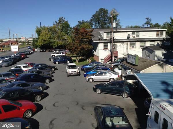 2 BUILDINGS AND CANOPY. USED CAR LOT & BUSINESS FOR SALE. IN BUSINESS FOR OVER 18 YEARS. 50 CARS ON LOT. NEXT DOOR SPACE RENTED & INCLUDES ANOTHER 50 CARS AND WATER. SEE DIAGRAM FOR LAYOUT OF LOT & BUILDING.