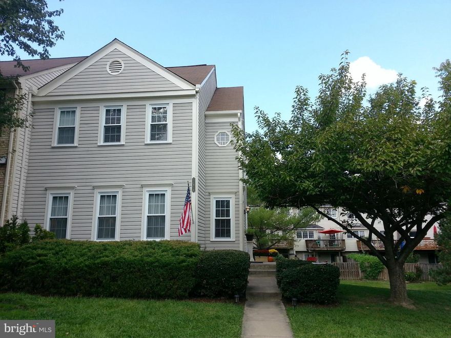 Beautifully Maintained 3 Bedroom, 2.55 Baths, End-Unit Townhouse, in the HEART of Lake Ridge Community*Master Suite w/ Full Bath and Walk-In Closet* Kitchen Upgrades Include Appliances, Counters, and Flooring *Huge Family room in basement w/ Fireplace, Wet Bar, Half-Bath and Sliders which Walkout to a Fenced  Backyard. Recent Upgrades include Windows, Carpet and Paint.2 assigned parking spaces!