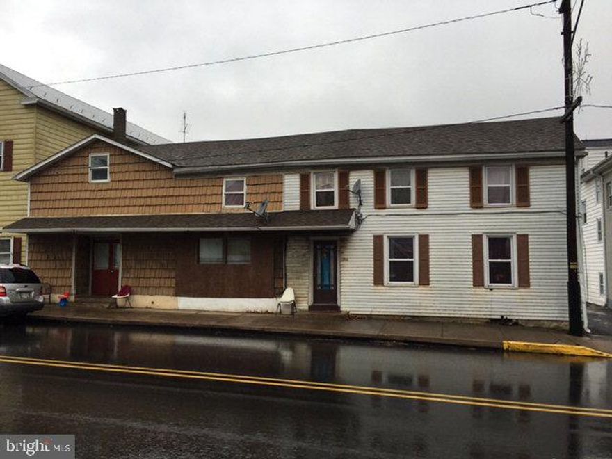 Large duplex with plenty of off street parking in Port Royal. Both sides are currently rented by a large family with long term potential. #310 is a 3 bed, 1 bath and #312 is 4 bed, 2 bath. Total rental income each month is $1,175.00. Each side have separate utilities with laundry hook ups and electric heat. Owners currently pay water/sewer, all other bills are covered by the tenants. The rear has parking for 12 vehicles and access to a workshop room for the owner to keep tools. Positive cash flow makes this a nice investment opportunity.