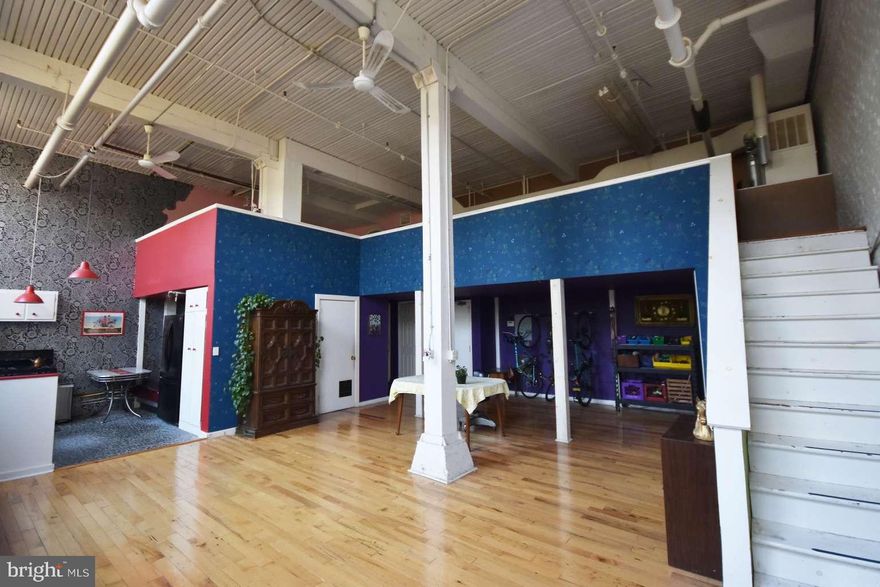 This expansive 1,300-square-foot, light-filled studio is nestled in the vibrant Greene Street Artists Cooperative, located in Philadelphia's historic Germantown neighborhood. This stunning space boasts a 1000-square-foot main level and an additional 300-square-foot loft, offering ample room for both creative work and comfortable living. A large closet, originally designed to be a photographer’s darkroom, could be used as a second bedroom, provide storage, or be returned to a darkroom. Facing east, the studio is bathed in gorgeous dappled morning light, with the windows that face Howell Park’s old oak trees. It also has a large private outdoor space right outside the unit. It's very private, but also feels open and airy at the same time. The communal space features a spacious lawn adorned with mature trees, a community garden (where each member has their own plot), a cozy fire pit, and a secure gated parking area. Additionally, the building offers shared, coin-operated laundry facilities for added convenience. Located near the scenic Wissahickon, Mt. Airy, and East Falls neighborhoods, as well as Germantown Avenue and the Schuylkill River, this location is a serene artist retreat with easy access to both nature and the city. About Greene Street Artists Cooperative (GSAC): GSAC is home to a close-knit community for artists. Becoming a member of the Greene Street Artists Cooperative is more than just finding a place to live, it’s joining a creative community where where artists live and work side by side to make this building and its grounds vibrant and creative. This unique space is perfect for a respectful, community-minded artist who values both privacy and creative freedom. Residents are expected to contribute a few hours of committee work each month. PLEASE NOTE: To be eligible to purchase this unit, applicant must identify as an ARTIST, with proof of an active artistic practice. This unit is currently for sale as CASH ONLY. Please find more information regarding the application process, including membership eligibility, membership application and the bylaws on the Greene Street Artist Cooperative's website.