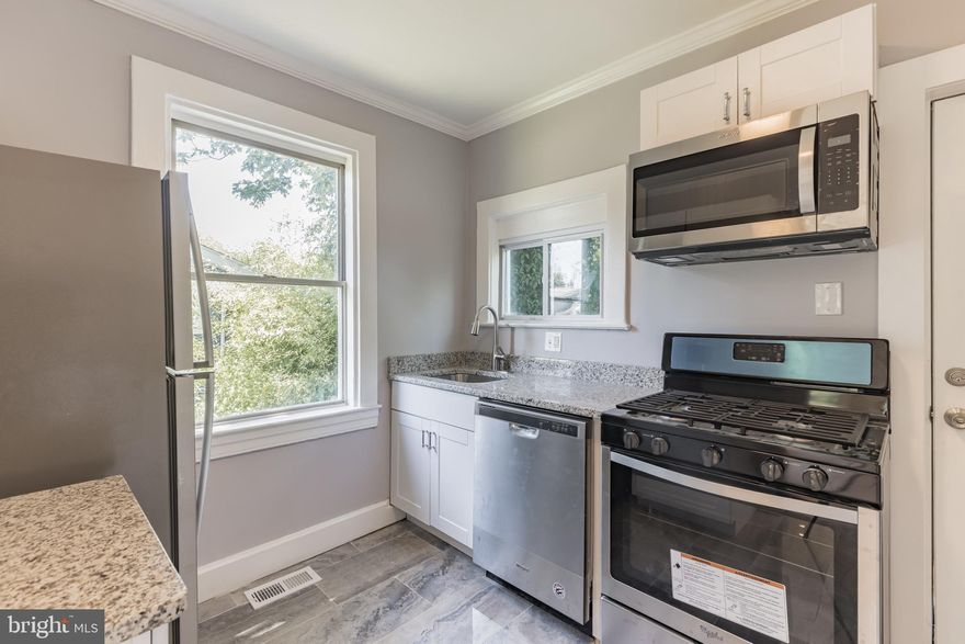 Top to bottom full renovation.  New Roof, New Kitchen, New Bathrooms, New Doors, New Flooring, NEW Fixtures, New Paint, New HVAC, and New Hot water heater.  This is a beautifully renovated property with 2 spacious bedrooms upstairs with a full bathroom.  The kitchen is completely renovated  with stainless steel appliances and granite countertops.  There is a walk out off the kitchen that opens onto a nice size deck, perfect for grilling and entertaining.  This kitchen lines up with a dinning room and family room which is equipped with recessed lighting and has an open concept. The basement is finished off with a bedroom, two rec rooms, laundry room, full bathroom, utility closet, and two storage rooms.   This basement does have its own entrance and could be a nice rental opportunity or the older kids would love it down there.    Tremendous opportunity!!