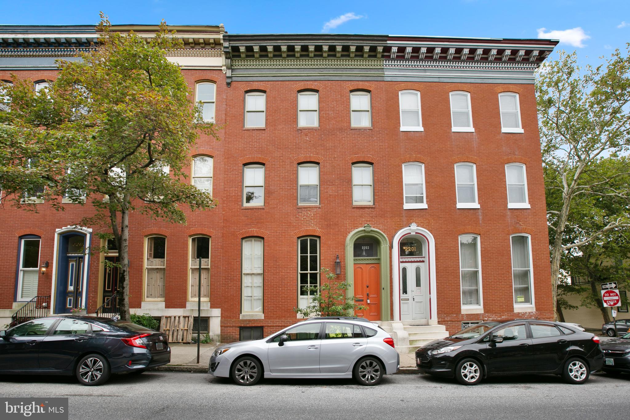 Welcome to 2203 East Pratt St! This historic home was built in 1914 and is only 1 block from Patterson Park! When you enter the home you are greeted by a grand entryway with 11 ft ceilings and hardwood floors. This 3 bedroom, 2 and half bath townhome has 5 working fireplaces, views of the harbor, a lovely garden and a two car garage! The large gourmet kitchen has Corian countertops, an island, three dishwashers, and plenty of natural light! The bedrooms are spacious and open, and the master bathroom will make you feel like you are in a spa. The natural light makes these spaces dreamy. There are ceiling fans and recessed lighting throughout the home. This home has over 3300 square feet of living space, and the modern touches are mixed elegantly with the historic charm.
Make your showing appointment today, as this one will not last long!