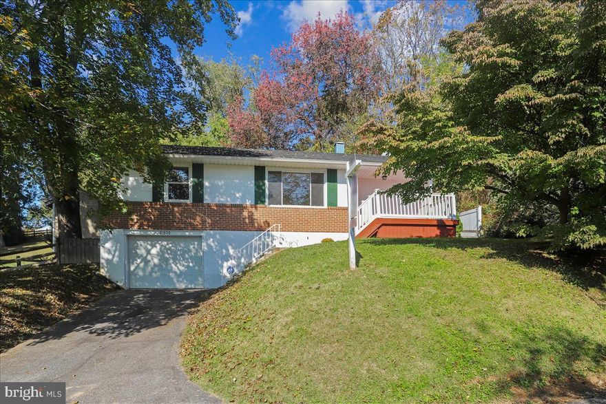 Cozy and Comfortable home with updated kitchen, stainless steel appliances. Huge rear deck with large fenced yard and storage shed. Fully finished lower level with entrance to garage. Full bath in lower level and Home Office with closet too. Front loading washer and dryer included.  Newer carpet, paint and water heater in 2019.  HVAC in 2017, Washer & Dryer and Shed in 2016 and Roof in 2015.  Lower Level pre-wired for multiple speakers.   Fenced rear yard with tire swing and large shed.  Storage closet in Lower Level.  Gorgeous views.