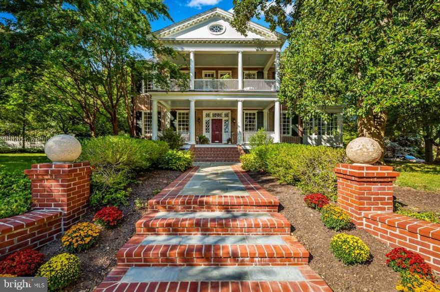 Majestic colonial resting on a  large, flat corner lot featuring  a catalogued  Southern Magnolia tree., one of Maryland's tallest. This home boasts 10.5 'ceilings, a grand center hall and twin 12' x 28' columned and  covered porches overlooking the quiet and elegant street.
 Original details throughout, include period mirrors, double-hung mullioned windows,  dentil & crown moldings and 3 fireplaces with mantles.  The spacious kitchen is charming with random width pine floors, a beamed ceiling ,wormy chestnut Amish cabinetry and a large center island complete with a copper hood.   In addition, the kitchen offers a fireplace and ample space for comfy seating or a large dining table.

This special home provides a primary suite which includes a sitting room, office and full bath in addition to the bedroom with fireplace.  Three additional bedrooms, one full and one half bath, along with  a laundry room complete the second floor.  The third floor offers a private get-away with  a bedroom and full bath.  The side yard, accessed from a covered kitchen porch, is fenced and private with an attractive stone patio.  It's easy to imagine an elegant garden party in this private oasis.   One of those houses much admired for its presence, 300 Somerset Road is available for the first time in nearly 30 years