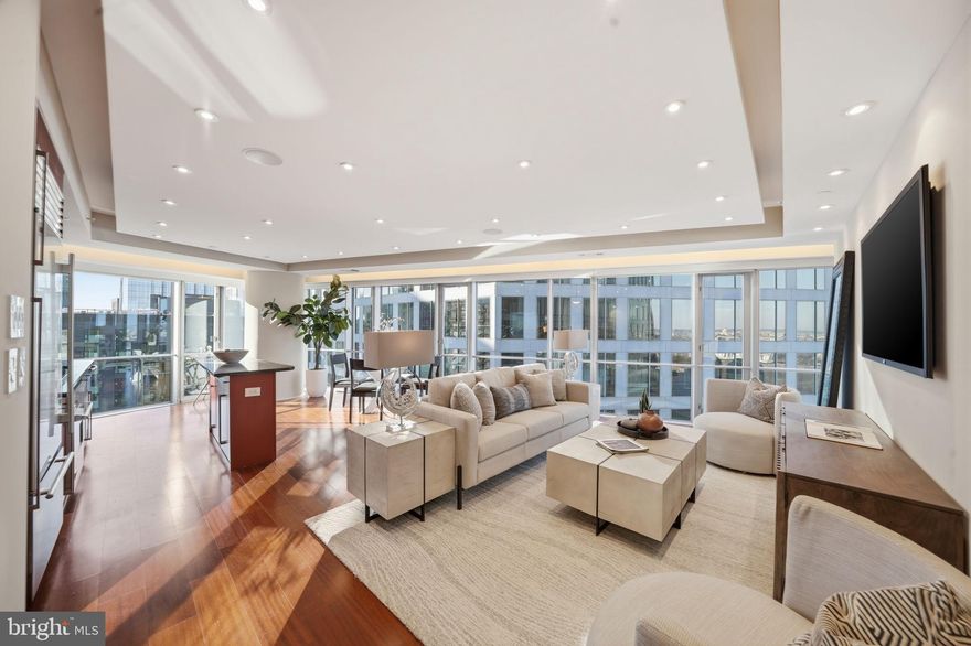 Welcome to The Waterview Residences, where quiet luxury and effortless living define one of Rosslyn’s most sought-after addresses in Arlington Virginia. This sun-drenched **27th-floor corner 2BR/2BA residence** is bathed in natural light from morning through evening, with floor-to-ceiling windows showcasing sweeping views of the Potomac River and Washington, DC skyline.

** The open living and dining areas flow seamlessly into a refined kitchen featuring a **Sub-Zero refrigerator, Viking gas cooktop, and Bosch dishwasher** — designed for both elevated entertaining and everyday ease.

** A rare **tandem 2-car indoor garage parking space** conveys with the home.

** Residents enjoy a full-service lifestyle with 24-hour concierge, secure access, a state-of-the-art fitness center, and a spectacular rooftop terrace offering panoramic views of the DC monuments, National Cathedral, DC City skyline, and watch the planes take off and land at Reagan National Airport. The building connects directly to the Le Méridien Hotel, currently undergoing renovation and set to reopen with a European infused menu inspired restaurant offering preferred dining privileges for residents.

** Just 1.5 blocks to the Rosslyn Metro and minutes to National Landing/Crystal City (Amazon HQ2), the Pentagon, Georgetown, and downtown DC, with immediate access to Route 66, GW Parkway, Route 50, Route 110, Wilson Blvd, and Langston Blvd. Steps to miles of scenic bike and running trails along the Potomac. Truly fits the #1 rule of wealth creation in real estate: "LOCATION, LOCATION, LOCATION"!

** Previously rented for $4,000–$4,250/month, this residence offers strong appeal for both owner-occupants and investors seeking a secure, light-filled, lock-and-leave lifestyle.

** From the moment you enter the lobby — with its attentive staff and polished calm — you can’t help but feel elevated. This is luxury, this is living well, without trying too hard.

*** OPEN HOUSE SATURDAY 4/21, 2-4PM & SUNDAY 4/22 AGAIN 2-4PM ***