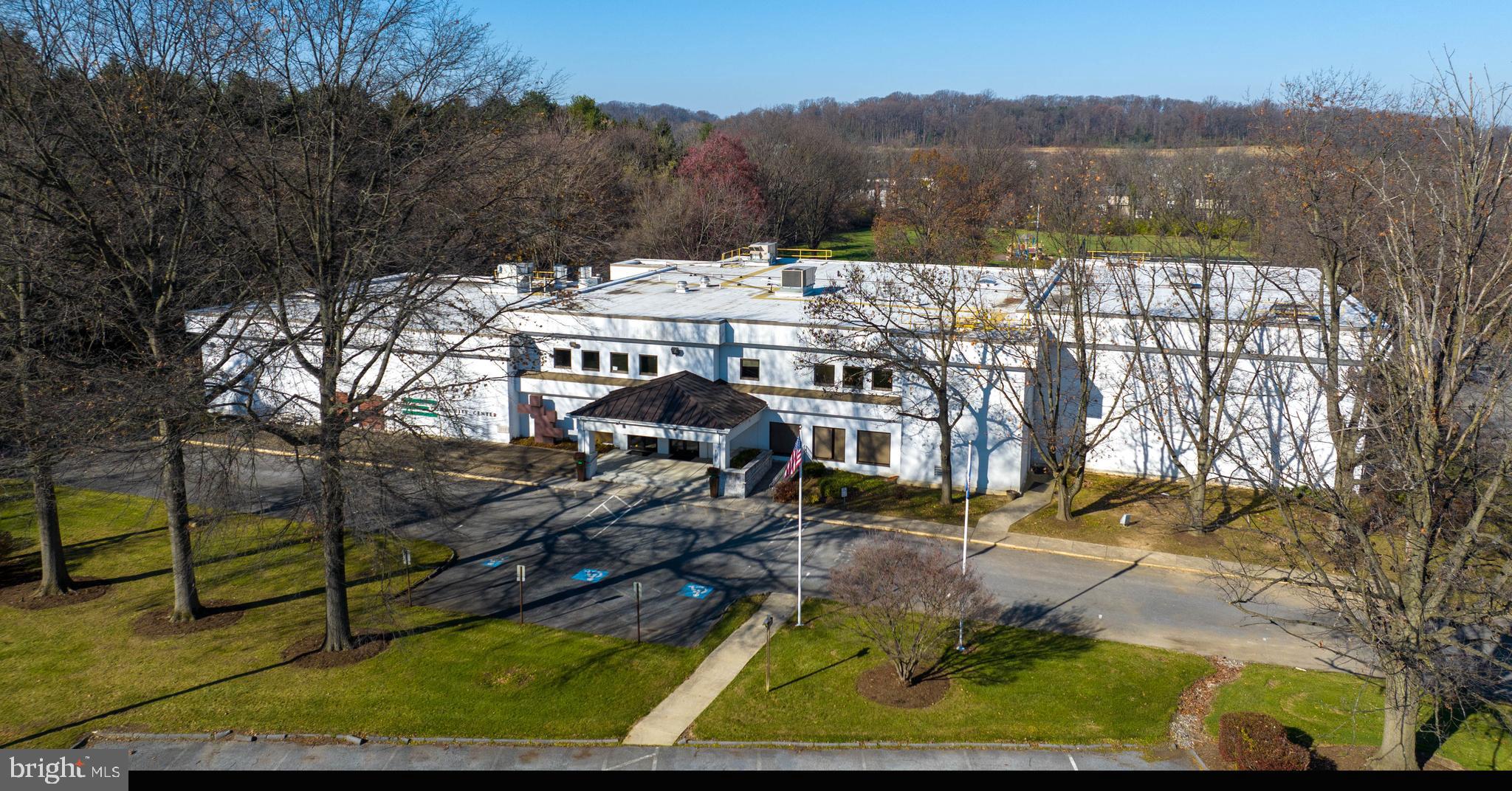 Freestanding building located along Oregon Pike (Route 272) in the heart of Manheim Township. Property was most recently used as community center/event space/offices and includes a commercial kitchen, ballroom, gymnasium, café space, conference room and private offices/classrooms as well as fiber-optic internet. Outdoor amenities include ample on-site parking, swimming pool, covered pavilion, tennis courts (2) and a large field with potential for multiple soccer/sports fields. Potential uses include event space, community club, house of worship, elementary/secondary school and more.