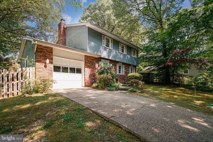 Welcome home to the highly sought after neighborhood of Cape St. Claire, located on the Broadneck Peninsula between the Chesapeake Bay and Magothy River.  This 4 bedroom 2.5 bath home is on a large corner lot 3 blocks from the beach.  Beautiful hardwood floors though out this lovely colonial.  Downstairs is open to your imagination....office space, home theater...as well, as a large storage area.  Off of the kitchen is a cozy sitting room with a wood burning fireplace and sliding glass doors to the backyard onto your deck.  Perfect area for entertaining.   Upstairs there are 3 large bedrooms, along with the master bedroom with master bathroom.  All bedrooms and living spaces have ceiling fans.  Brand new Hybrid furnace/heat pump installed in October 2020.  Both the roof, the well pump and the SS appliances are under 5 years old.