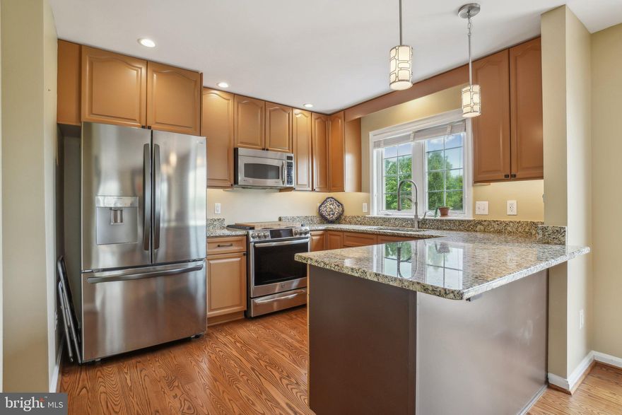 **** HUGE PRICE IMPROVEMENT ****  
   Motivated Seller !!!! Welcome Home! This exquisite three-bedroom, three-and-a-half-bathroom single-family home is nestled within the desirable BRISTOW MANOR ESTATES community. The pride of ownership is evident in this gem, which stands alone at 11116 STAINSBY CT. This magnificent and meticulously maintained single-family home boasts a brick frontage facing hole 1 and the rear aligns with the ladies’ tee of the second hole of the Bristow Manor Golf Course. Upon entering, you will be captivated by the recent renovations throughout the property. The foyer, adorned with fresh paint and updated lighting fixtures, leads to the front living room/Office and dining room, which feature an open floor plan. The soaring two-story front entryway exudes elegance with its stunning upgraded chandelier. The family room boasts updated lighting, large windows, an upgraded stone fireplace with a new mantle that extends to the ceiling, and hardwood floors. The gourmet kitchen features new granite countertops, upgraded 42-inch cabinets with under-cabinet lighting, stainless steel appliances, a pantry, recessed lighting, and a large window overlooking the rear yard and golf course. The breakfast area has been updated with new lighting and a sliding glass door to the rear 21x16 deck. The main level also includes a half bathroom. Upstairs, you will find the primary bedroom with newer carpet, vaulted ceilings, a ceiling fan, and a spacious walk-in closet. The primary bathroom has been renovated with quartz countertops, new lighting, glass-enclosed shower, soaking tub, and new tile flooring. Bedroom 2 features newer carpet, fresh paint. Bedroom 3 has also been freshly painted and features newer carpet. The upper level hallway includes a full bathroom with updated lighting and a mirror. The upper level hallway also features updated lighting and fresh carpets. The basement has been freshly painted, recessed lighting has been installed, and an open concept has been created with a window and walk-up egress to the backyard.  The lower level also includes a spacious play area or exercise room, a man cave, and a fully equipped bathroom. Additionally, there is a two-car side-loading garage with an exceptionally long driveway. The property boasts a large, flat, grassy yard equipped with stunning and breathtaking views. Location, Location, Location!!! The opportunities are endless to enjoy and create the only things that truly matter... Memories! 

   ** Owner use of homesite is approximately 0.6 approximately 9.4 acres are provided as an easement to the golf course. * *

    ***The following are a list of upgrades done to this masterpiece***
06/16/14 Roof  
06/16/14 Siding
11/13/15 Repave Driveway
10/2/2015 Dishwasher
6/27/2016 Pressure tank for water heater 
7/27/2016 Water Softener 
9/8/2018 Garage Door Opener 
11/15/2018 Deck
3/5/2019 New Septic & External Sump 
8/21/2019 In line water UV Light Install 
10/3/2019 Landscaping
1/10/2020 New HVAC 
1/10/2020 Stove 
12/28/2021 Well Pump Replacement
9/16/2022 LG Refrigerator