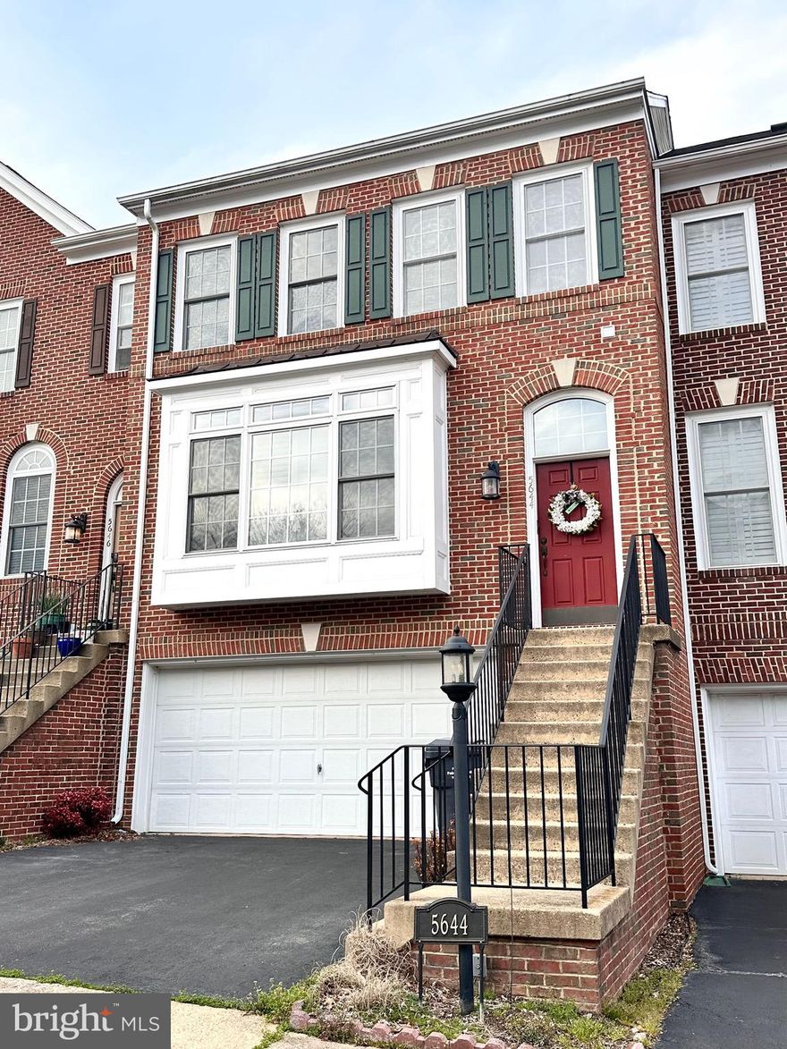 Governors Grove 3BR/2.5BA TH w/ 3LVL Extension & 2 Car Garage! Just 1 mile to Metro! Premium lot backing to greenspace & trees. Hardwoods on main lvl. Plantation shutters. Gourmet kitchen w/ tons of cabinet space, bar, granite, SS appliances. Sunroom w/ gas FP. Walkout to flagstone patio w/ gas line for grill. Inground sprinkler system. Huge primary suite w/ sitting room & walk-in closet. Laundry conveniently on BR lvl. Sought after neighborhood w/ tennis, playground, dog run, walking trail, pond. Mins to Ft Belvoir, Mark Center, Old Town, Pentagon, DC!