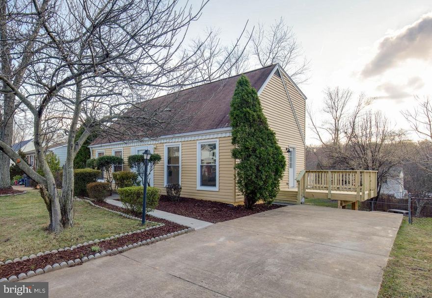 Beautiful Cape Cod w/spacious rooms and huge yard. This home features 4 big BR (2 on main level), 3 BTH -completely updated. Features incl, new: HVAC system, siding, windows, deck, granite counter tops, soft close kitchen cabinets w/Samsung stainless steel appliances and lovely bonus rooms in basement w/ next gen Pergo flooring, full BR and walkout.  Good for commuters, close to shops. Don't miss!