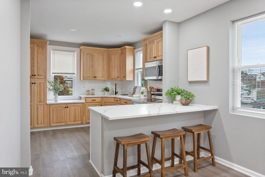 Stunning and rarely available 5 Bed 3 bath home for sale. Main floor greets you with a bright and open floor plan. Updated kitchen with quartz countertops, island peninsula and new stainless steel appliances. Generous living room and a designated dining room. Main level bedroom and a full bath complete this floor. The 2nd level offers another living/family room area. 3 bedrooms and 2nd Full bath with dual vanities. Full walkout lower level elevates this home by offering a large living room, wet bar, 5th Generous size bedroom and a 3rd bathroom with a walk in shower and custom tile work. Designated Laundry room. Additional Storage room. Covered Front porch. Covered back patio. Oversized corner lot. Long driveway for 3-4 cars. Schedule your showing today.