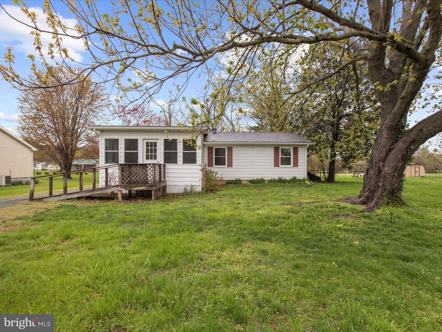 Welcome to this beautifully updated 3-bedroom, 2-bath rancher in the heart of Rock Hall, Maryland! Renovated in 2020, this home shines with modern updates while maintaining its cozy charm. The spacious floor plan is filled with natural light, enhanced by large windows and a lovely sunroom—perfect for enjoying your morning coffee or unwinding in the evening.  The updated kitchen features contemporary finishes, ample cabinet space, and flows seamlessly into the dining and living areas, creating a welcoming atmosphere for entertaining. The primary suite offers a private retreat with an en-suite bath, while two additional bedrooms provide flexibility for guests or a home office.  Located just minutes from Rock Hall’s marinas, waterfront dining, and outdoor recreation, this home offers the perfect blend of comfort and convenience. Whether you're looking for a full-time residence or a weekend getaway, this gem is ready for you to move in and enjoy!
