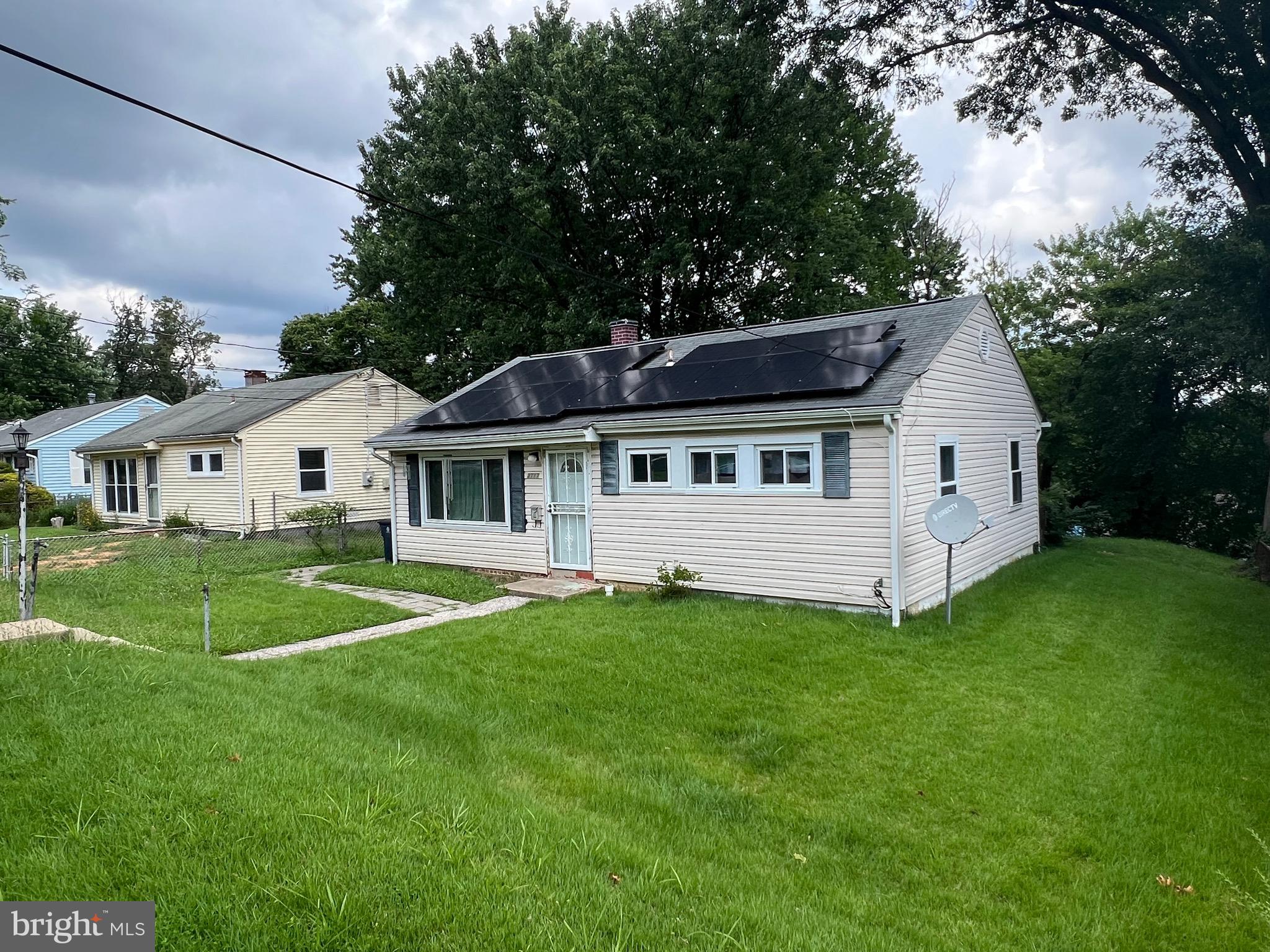 Priced to move. Great location, inside the Beltway, but close to all major traffic routes, Rt 410, 450, 50, 295, 495. Get to most major business districts within 30-45 minutes, including DC, Annapolis, Baltimore, Columbia, Silver Spring, etc. Home can be moved in at settlement, but we recognize that buyers still tend to want to do their own finishing touches, so the owner is selling "as-is" and has priced it accordingly. Look at the comps where additional features have been added, and the price is much higher. Most of the more expensive home have additions that almost double the square footage, and the backyard is large enough to support an addition and leave plenty of space for a garden, or an outdoor oasis. Kitchen and bathroom have been completely remodeled. Should be only minor repairs necessary, home inspection should confirm. Solar panels are on the home, which will reduce electricity bills significantly. Buyer can take over payments, or seller can have them removed. Their choice.