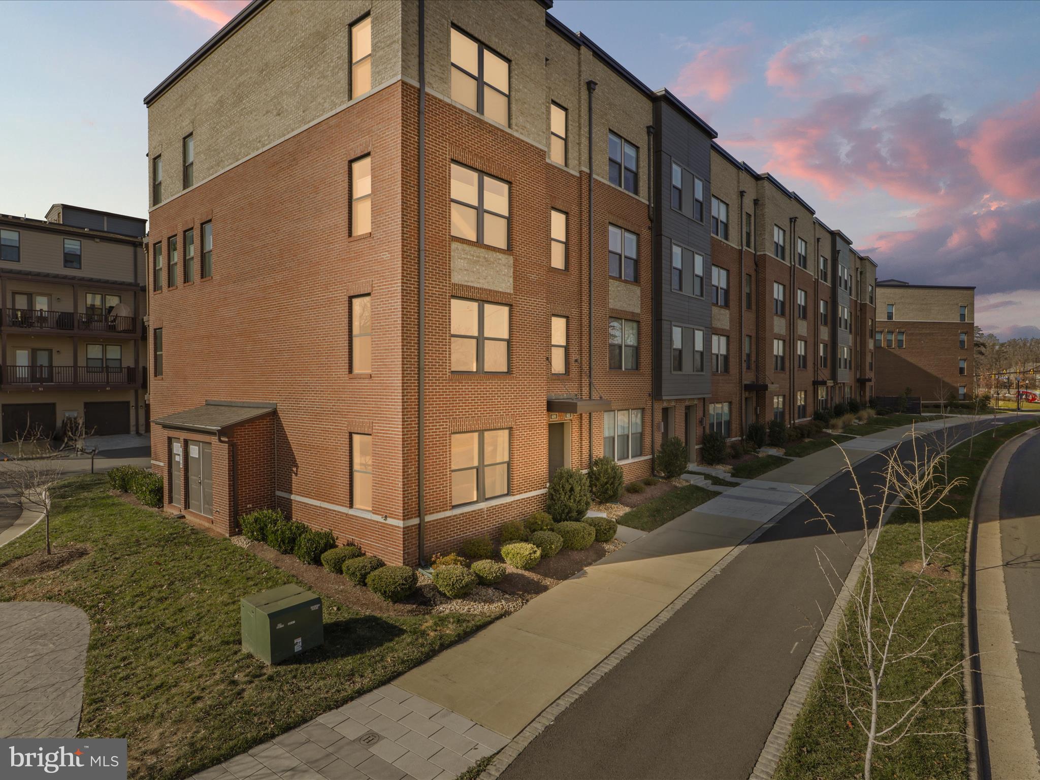 **For Rent**Walk to Metro**Stunning 2 Level End-Unit Town Home Style condo For Sale**Live in the suburbs with easy access to the city (only a .3miles from the OPEN(Herndon Station) Silver Line Metro!) in this gorgeous and cozy 2 level condo at 1600 sq. ft. This spacious interior unit condo has 2 bedrooms, 2 full and 1 half baths, and 1 car garage!Loft can be converted to a 3rd Bedroom. This modern end-unit townhouse conveniently located in Herndon, VA, just a stone's throw away from the metro station and a tons of shops, grocery stores, and amenities. Built in 2018, everything in this complex is less than 10 years old, ensuring a contemporary and well-maintained living experience. As an end-unit, this townhouse boasts additional windows that provide the space with great natural light, creating a bright and inviting atmosphere.Be greeted with beautiful wide plank flooring on the open concept main level with great room, dining rooms, and modern kitchen. The kitchen features elegant Granite countertops, Custom 42" cabinets, stunning tiled backsplash, and stainless steel appliances. A half bath and closet complete this level, along with convenient access to your garage. Upstairs, you'll find two generous bedrooms with their own bathrooms, offering comfort and privacy for everyone. Additionally, a bonus loft/den space provides versatility, whether you need a home office, entertainment area, or a cozy reading nook. With tons of development on the horizon for the area, now is the perfect time to invest in this property and capitalize on all the expanding community has to offer.Additional perks include washer/dryer and window blinds, as well as decorative light fixtures.! Large 1 car garage with plenty of storage and a long drive way plus ample of street parking Side of the Unit with unobstructed views of the green open space. Enjoy this vibrant new community with a great location so close to the metro and quick access to the Dulles Toll Road! Amenities include dog park, jogging/walking paths, tot/lots playgrounds, worldgate. gym plus so much more! The home offers the ultimate lifestyle with convenient access to Herndon and Reston world-class amenities. The location is perfect: across Herndon Pkwy. to Fairfax Connector Bus and about 0.5 miles to Silver Line Metro station. Or mere minutes' drive to some of the area's largest employers as well as shopping, dining & entertainment opportunities.Don't miss out on this great opportunity to be a part of a thriving and growing neighborhood in Herndon.