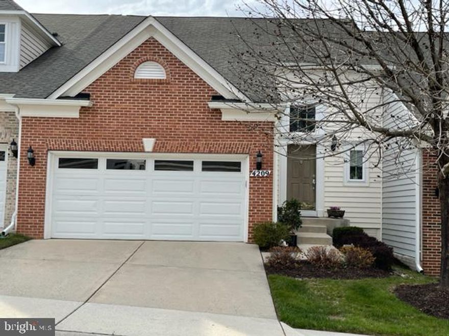 Welcome to this lovely villa with two car garage in the sought after 55+ community of Village Crest! This home offers main level living at its best, featuring custom designed window treatments by Hunter Douglas, gleaming hardwood floors spanning from the foyer through the open concept living/dining areas, kitchen and right into the carpeted main level primary bedroom! The spacious eat-in kitchen provides the perfect place to prepare and enjoy your meals. The kitchen boasts upgraded GE Profile appliances. Comfort abounds in the main level primary suite boasting walk in closet and deluxe full bathroom. The upper level has a loft style sitting area overlooking the main level living area, 2 sizable bedrooms with generous closets, another full bathroom and an office/hobby area! The fully unfinished lower level is huge and can be used as a large storage room or your design. This amazing community offers a clubhouse, indoor and outdoor pools, fitness center, community events and so much more! All the staged items coveys! This home is move-in ready!